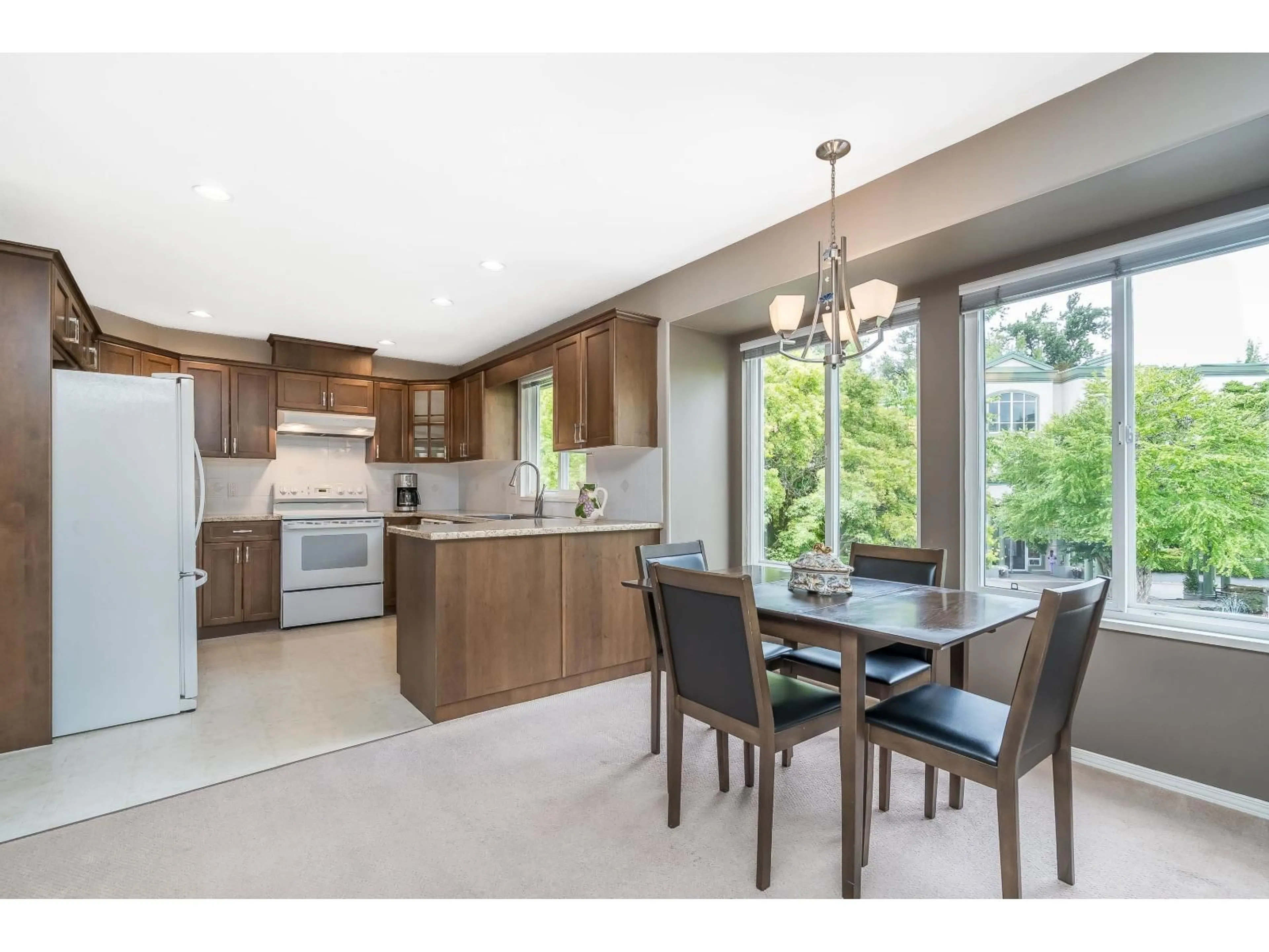 Open concept kitchen, unknown for 107 - 13888 70 AVENUE, Surrey British Columbia V3W0R8