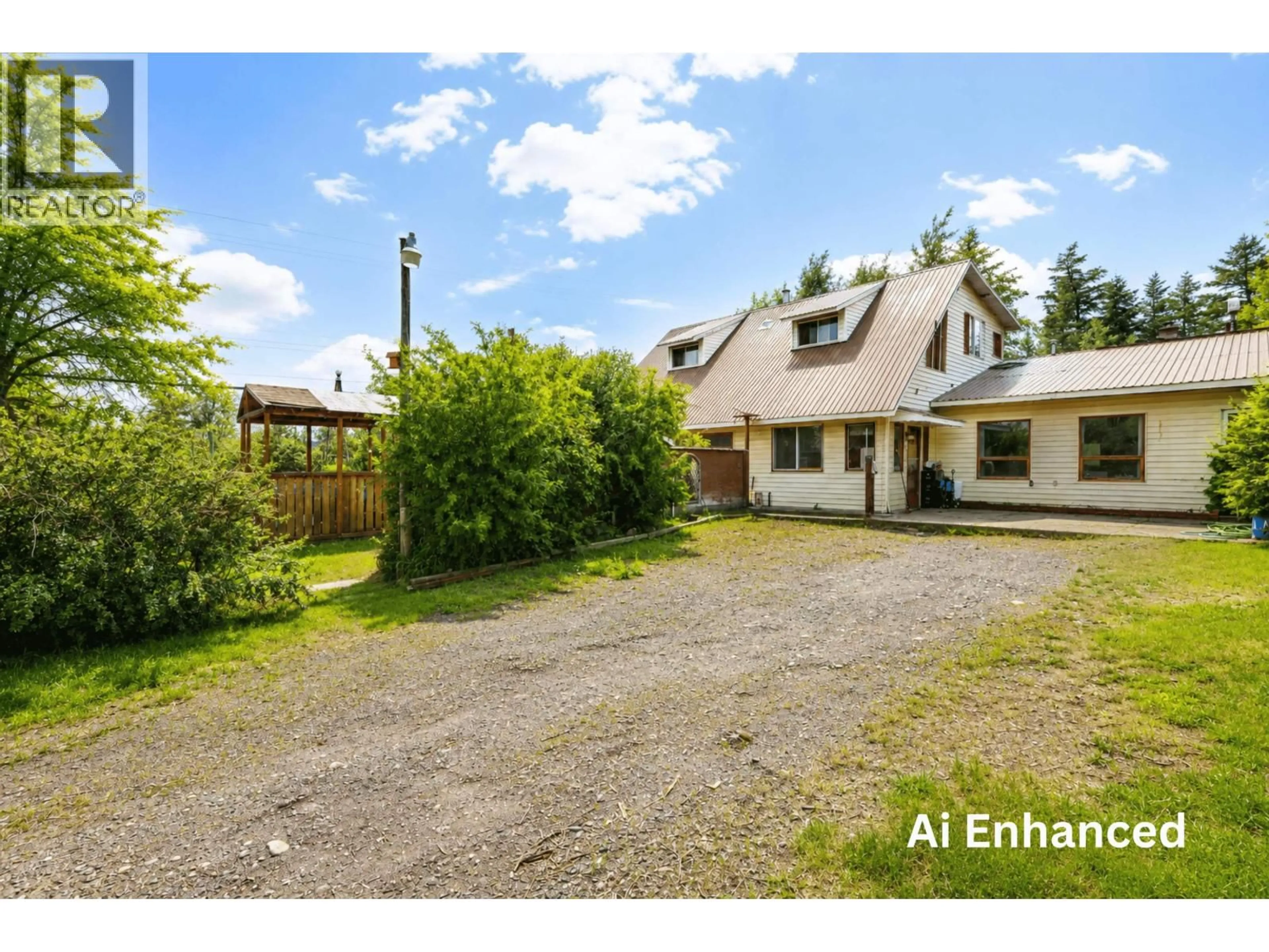 A pic from outside/outdoor area/front of a property/back of a property/a pic from drone, street for 3797 DODGE ROAD, Lac La Hache British Columbia V0K1T1