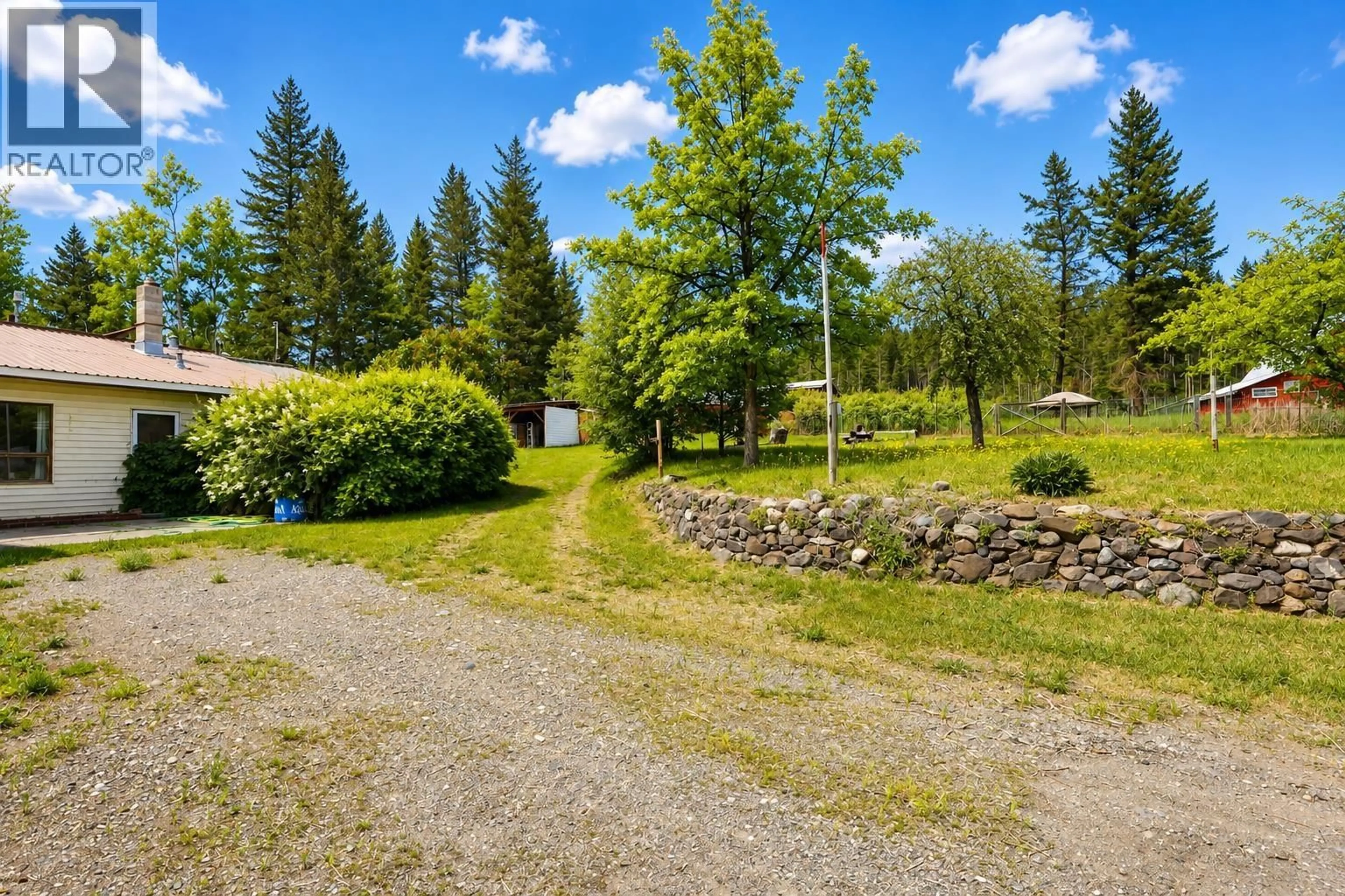 A pic from outside/outdoor area/front of a property/back of a property/a pic from drone, unknown for 3797 DODGE ROAD, Lac La Hache British Columbia V0K1T1