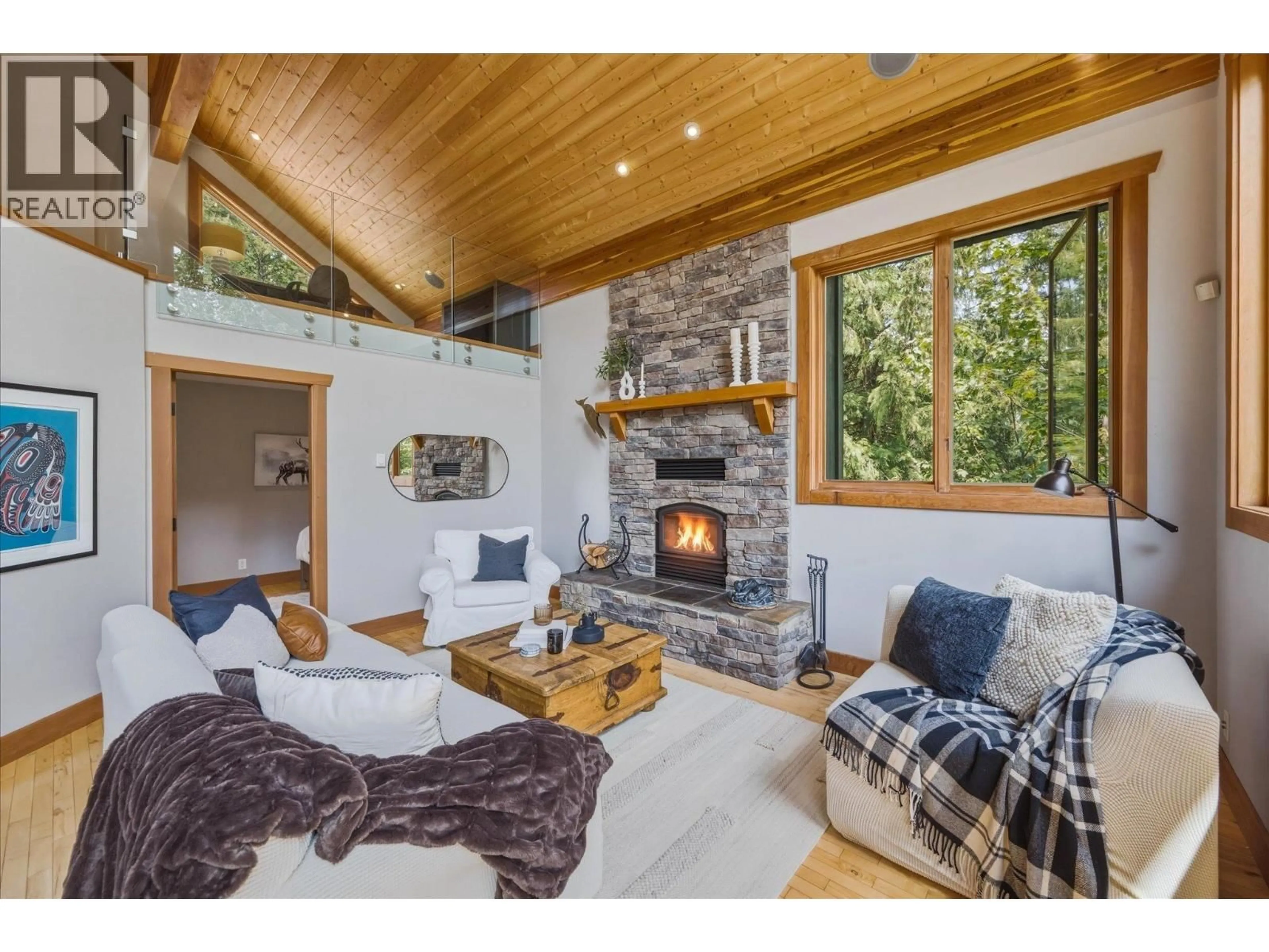 Living room with furniture, wood/laminate floor for 8633 FOREST RIDGE DRIVE, Whistler British Columbia V8E0G1