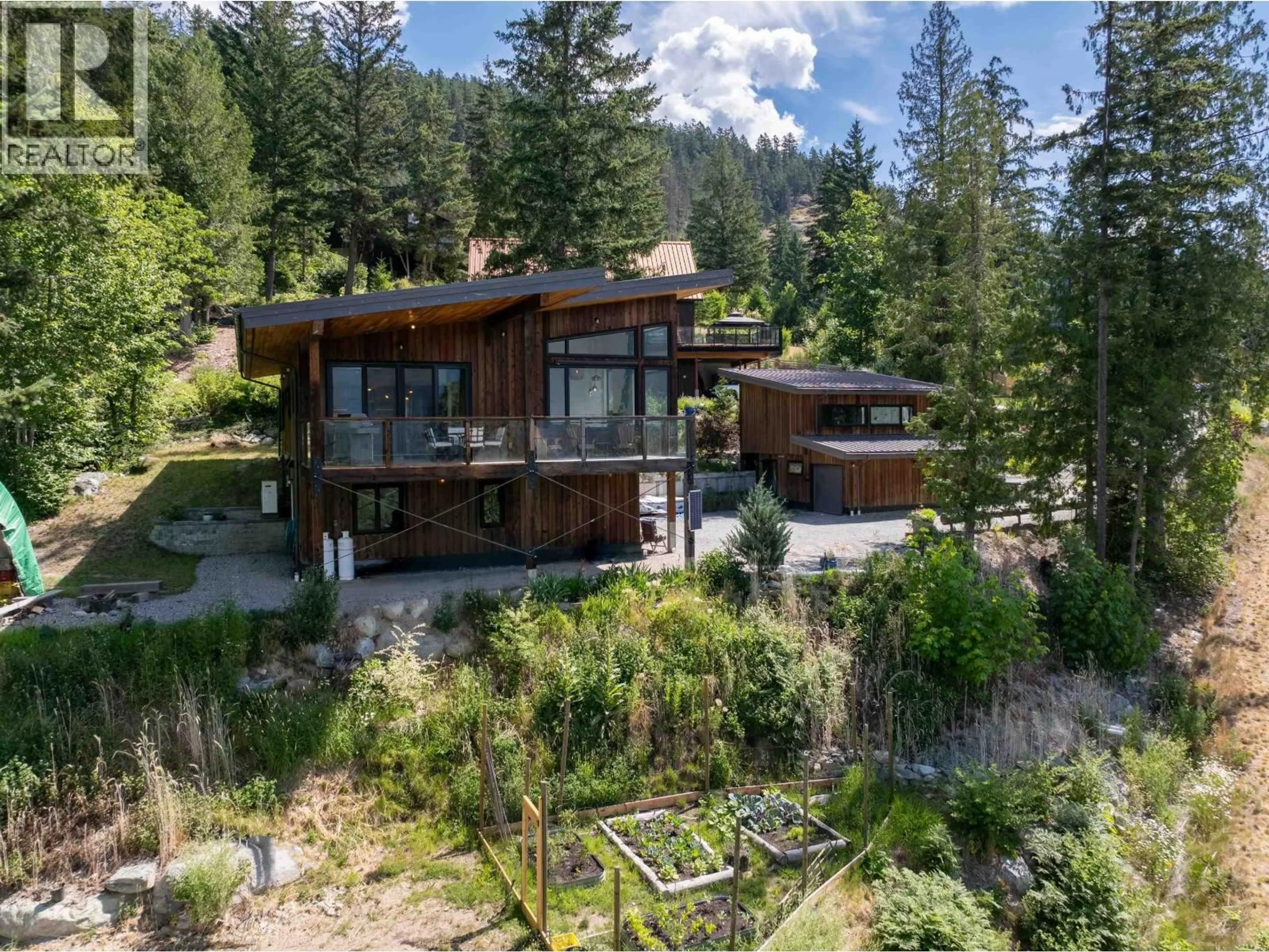 A pic from outside/outdoor area/front of a property/back of a property/a pic from drone, unknown for 1715 WISHBONE COURT, Pemberton British Columbia V0N2L3