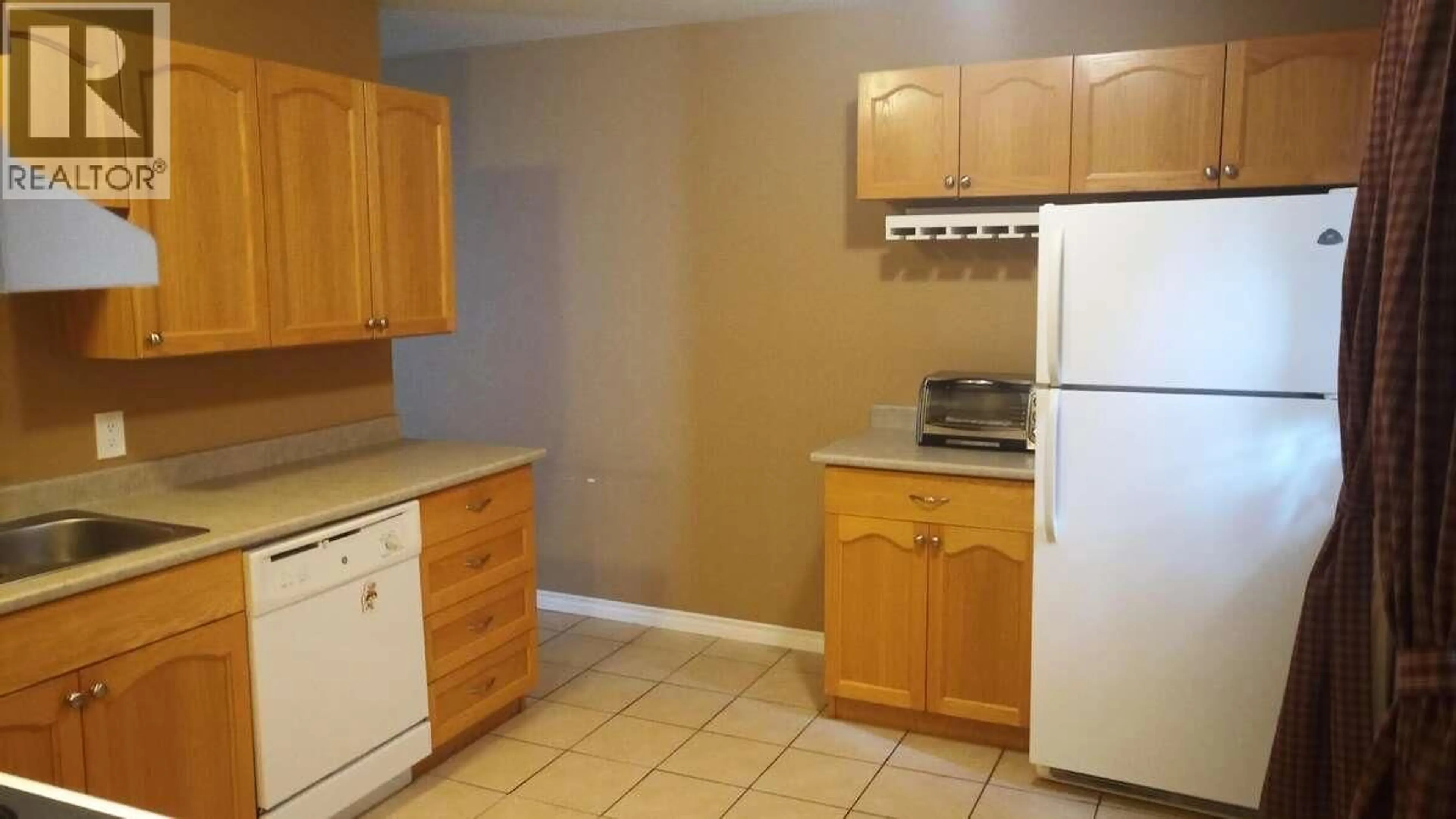 Standard kitchen, unknown for F34 - 1900 STRATHCONA AVENUE, Prince George British Columbia V2L2V9