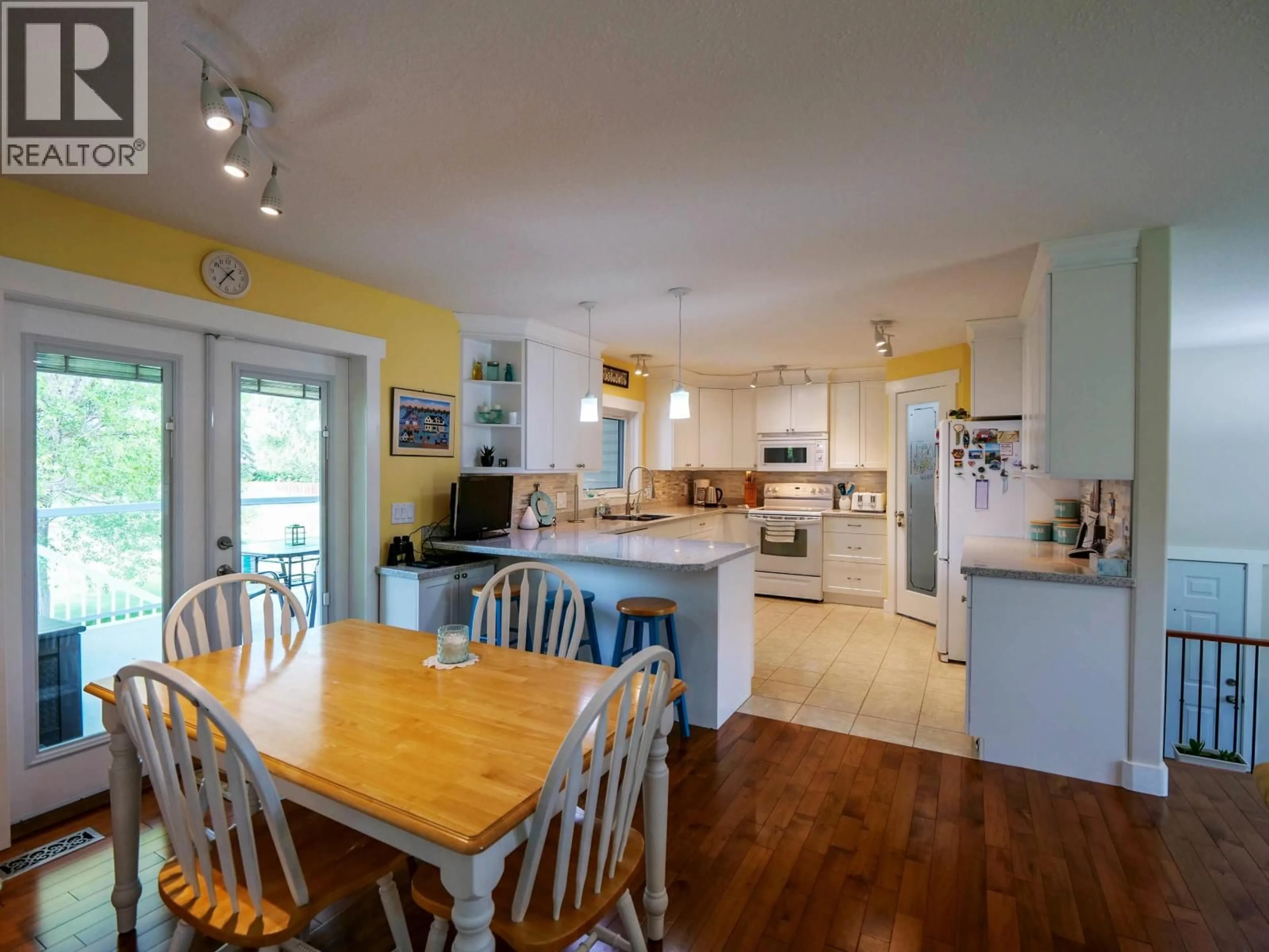 Open concept kitchen, wood/laminate floor for 1601 FLINT ROAD, Quesnel British Columbia V2J4L9