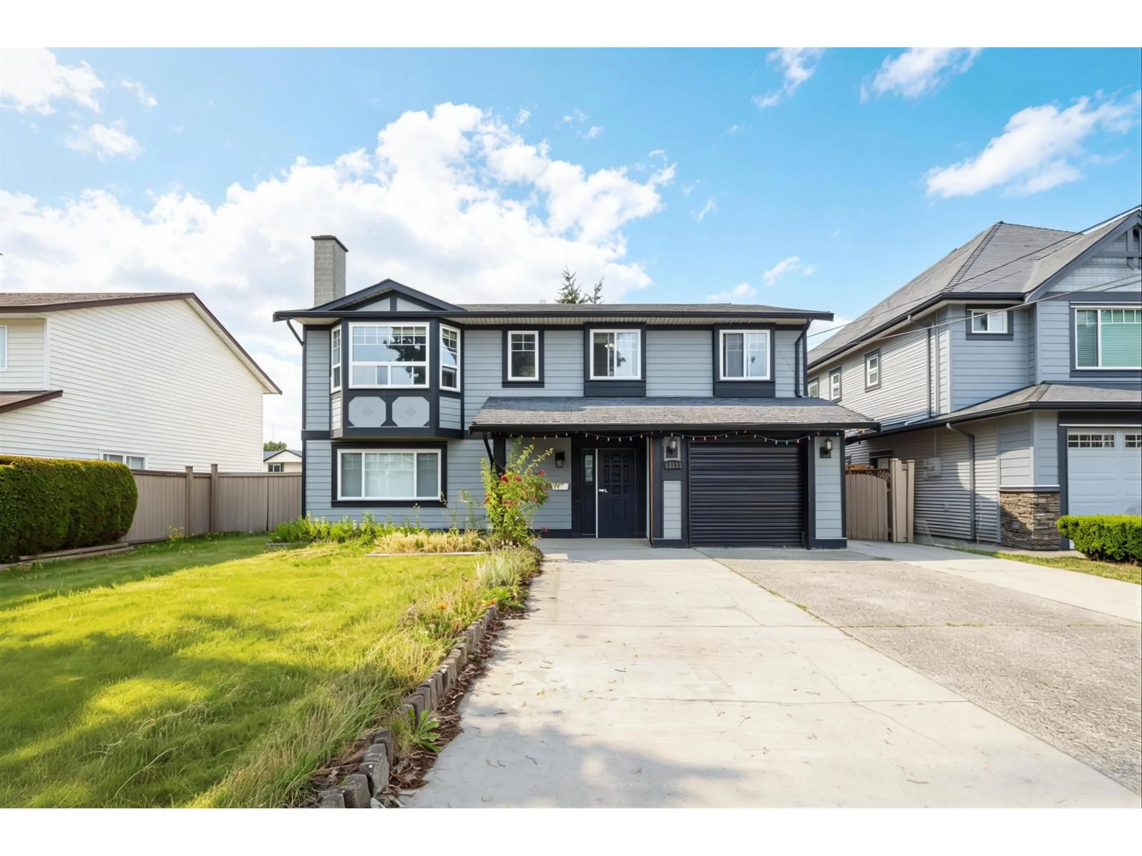 Home with vinyl exterior material, street for 13111 73A AVENUE, Surrey British Columbia V3W2R8