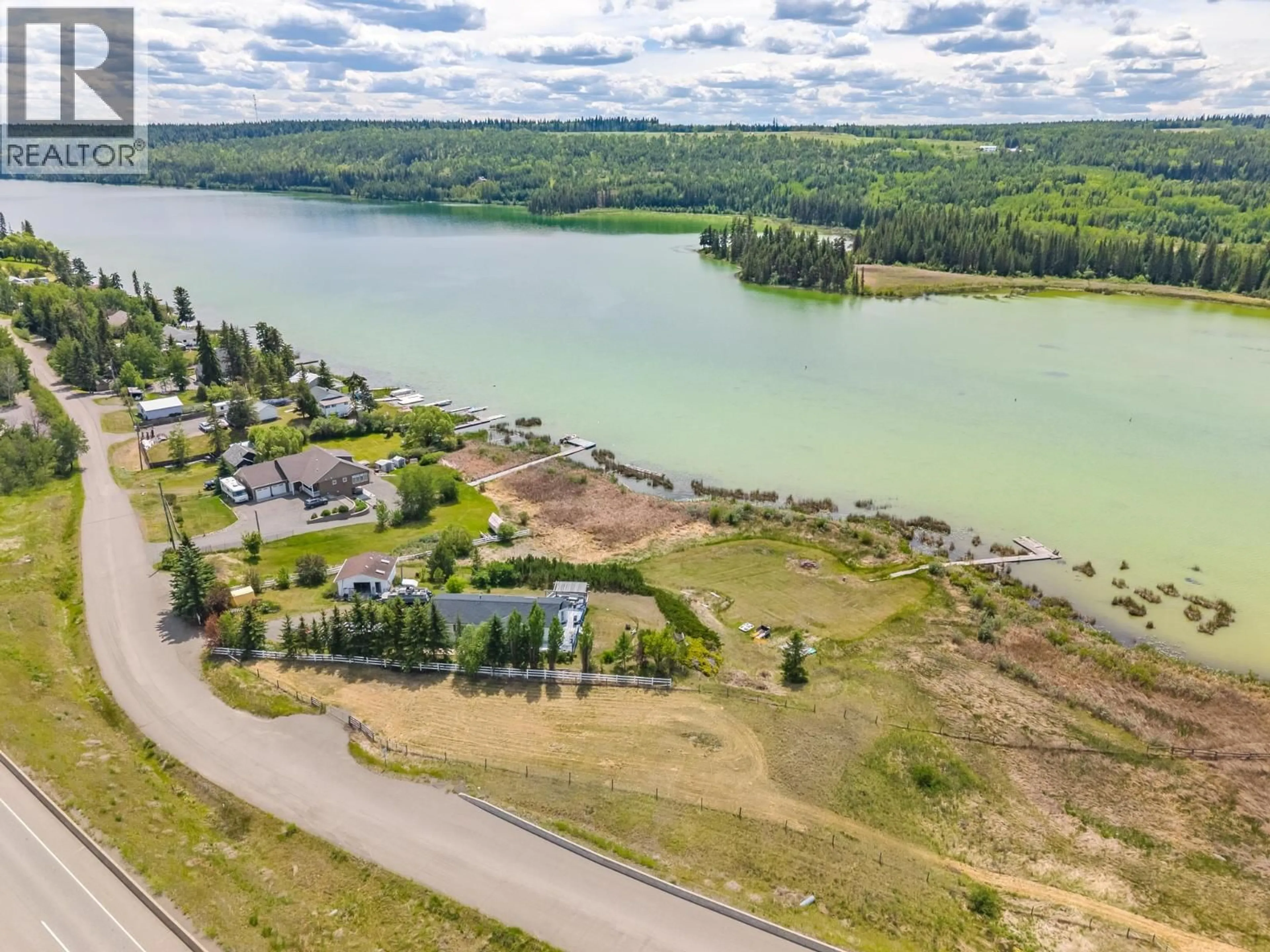 A pic from outside/outdoor area/front of a property/back of a property/a pic from drone, water/lake/river/ocean view for 3442 DUNSMUIR ROAD, Lac La Hache British Columbia V0K1T1