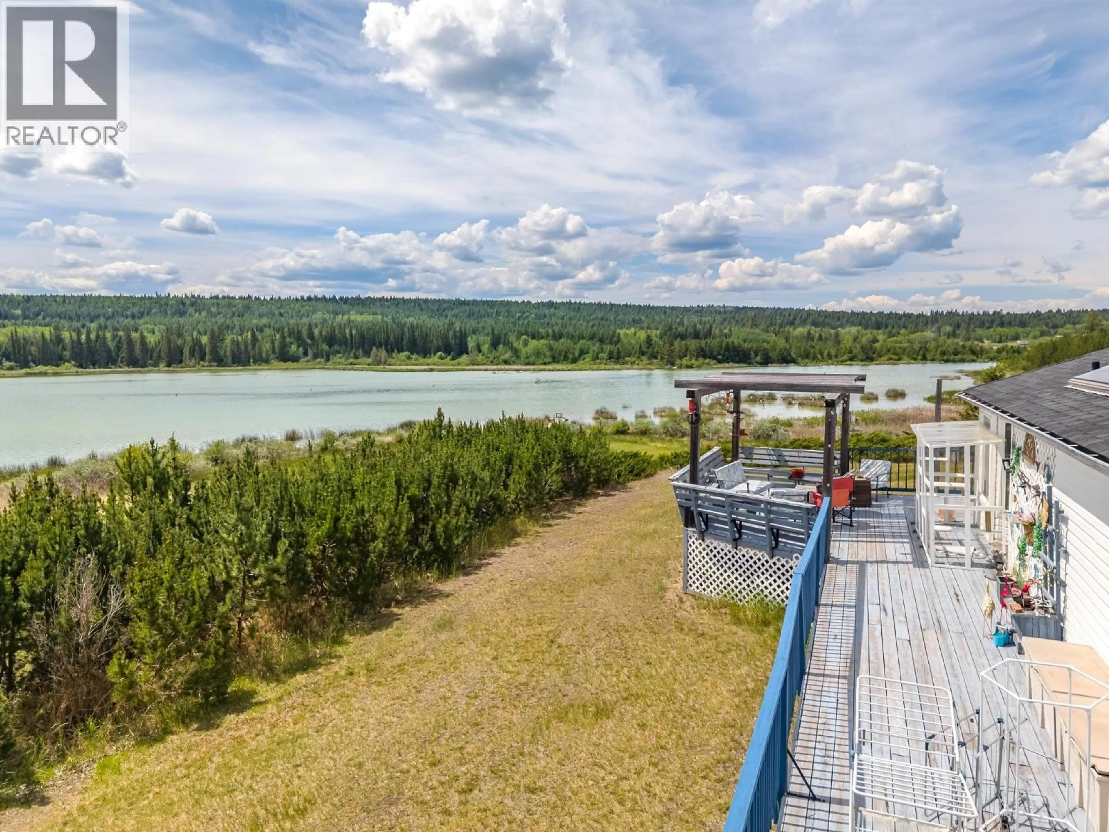 A pic from outside/outdoor area/front of a property/back of a property/a pic from drone, water/lake/river/ocean view for 3442 DUNSMUIR ROAD, Lac La Hache British Columbia V0K1T1