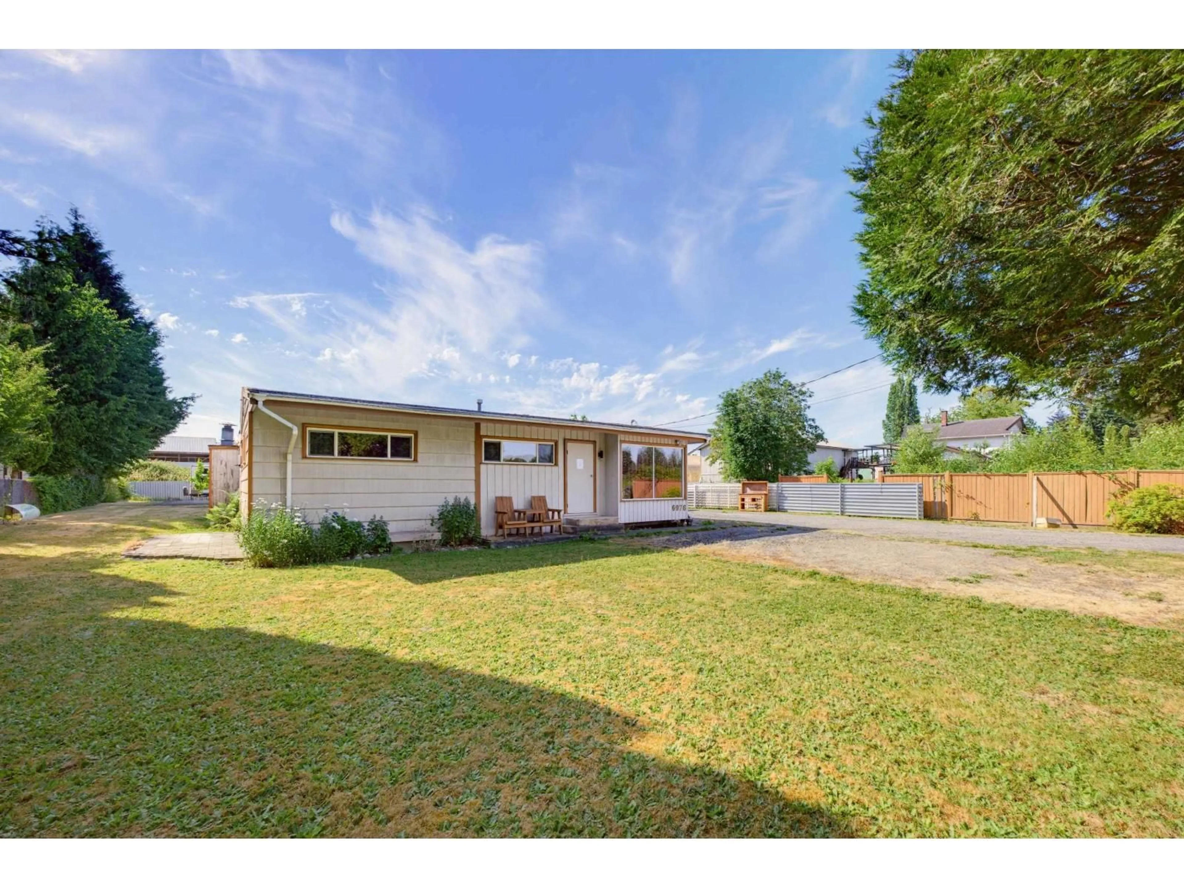 A pic from outside/outdoor area/front of a property/back of a property/a pic from drone, street for 6976 GLOVER ROAD, Langley British Columbia V2Y1X9