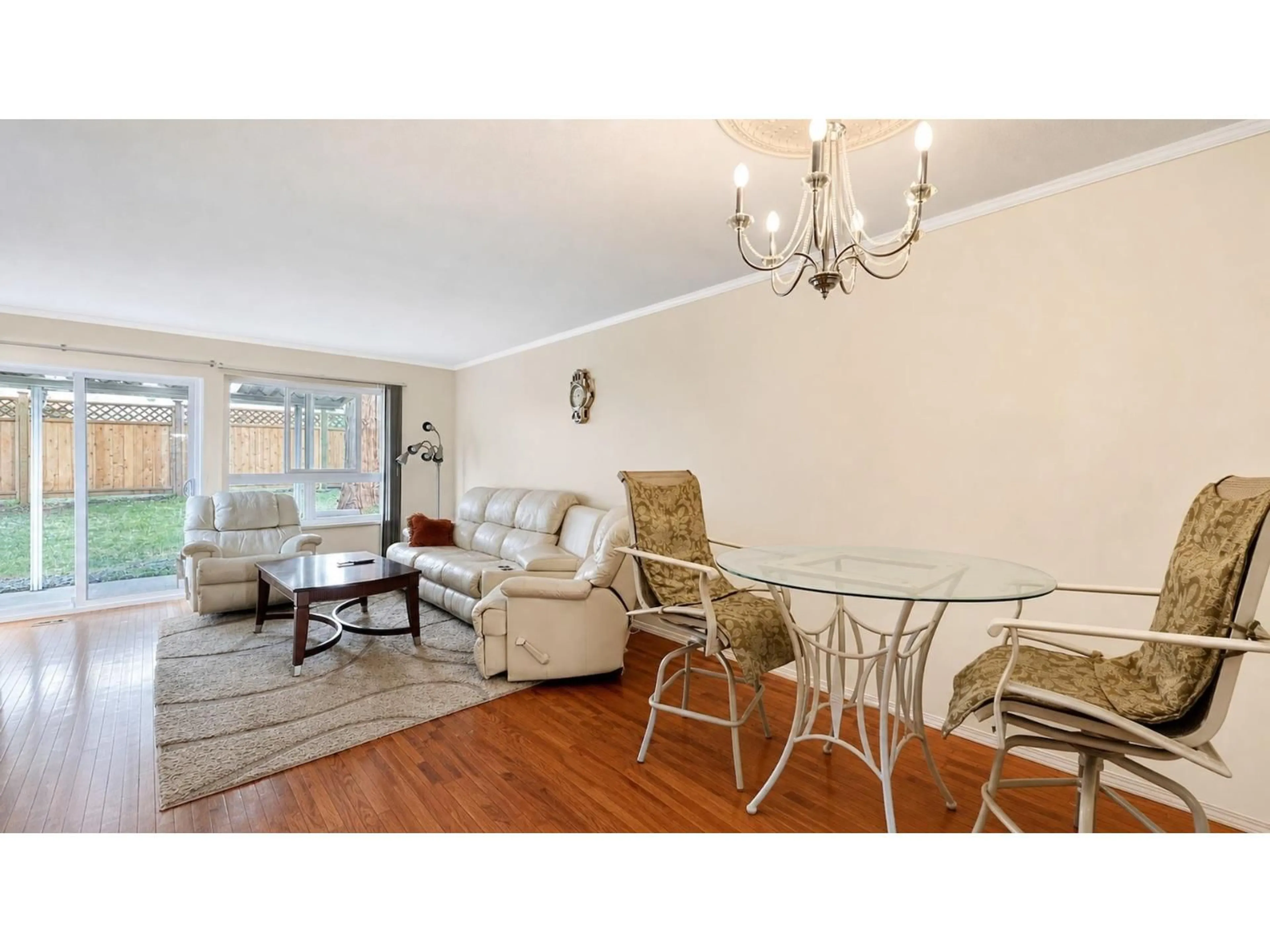 Living room with furniture, wood/laminate floor for 105 - 12233 92 AVENUE, Surrey British Columbia V3V7R8