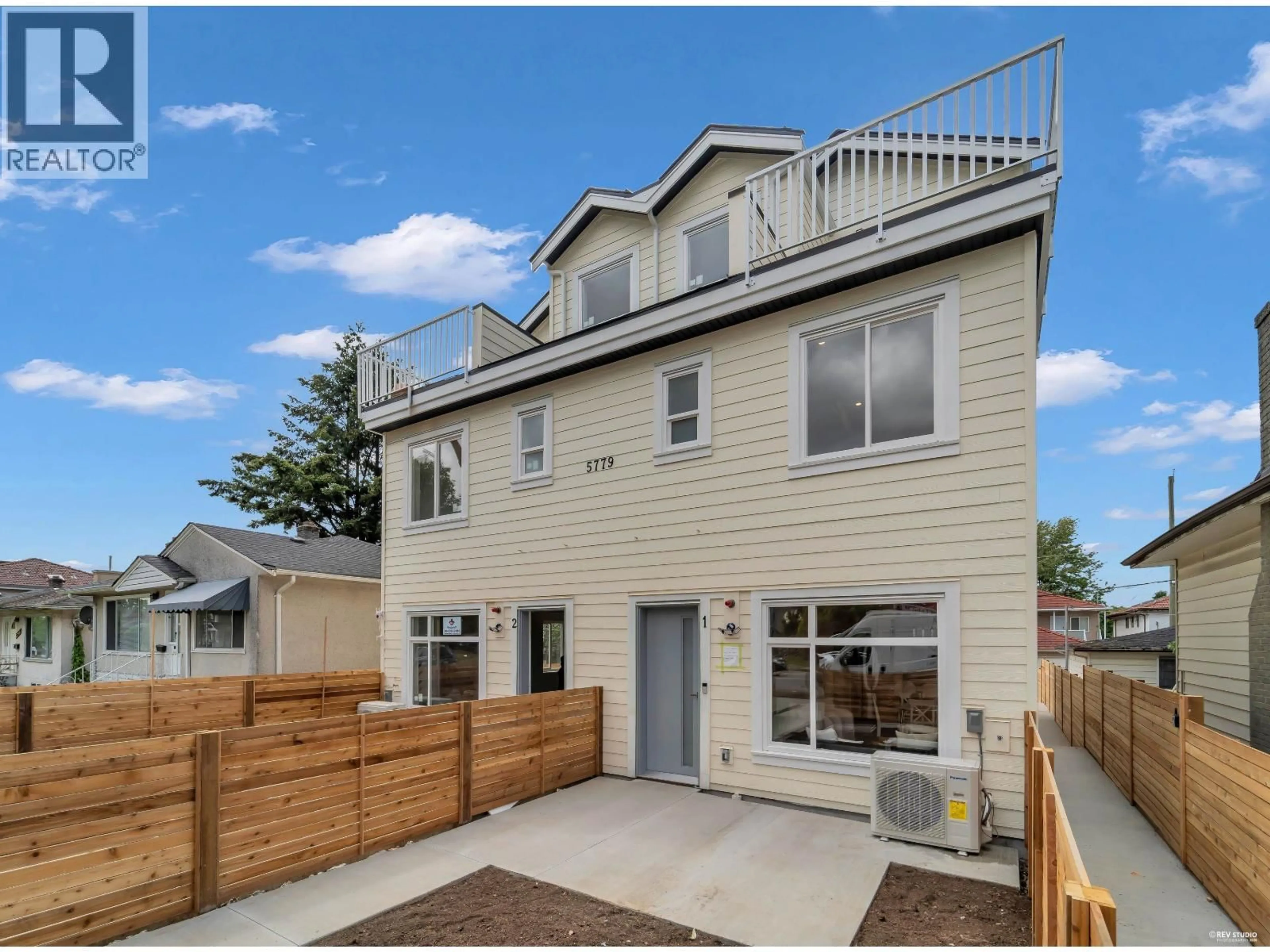 Home with vinyl exterior material, street for 2 - 5779 CLARENDON STREET, Vancouver British Columbia V5R3K4