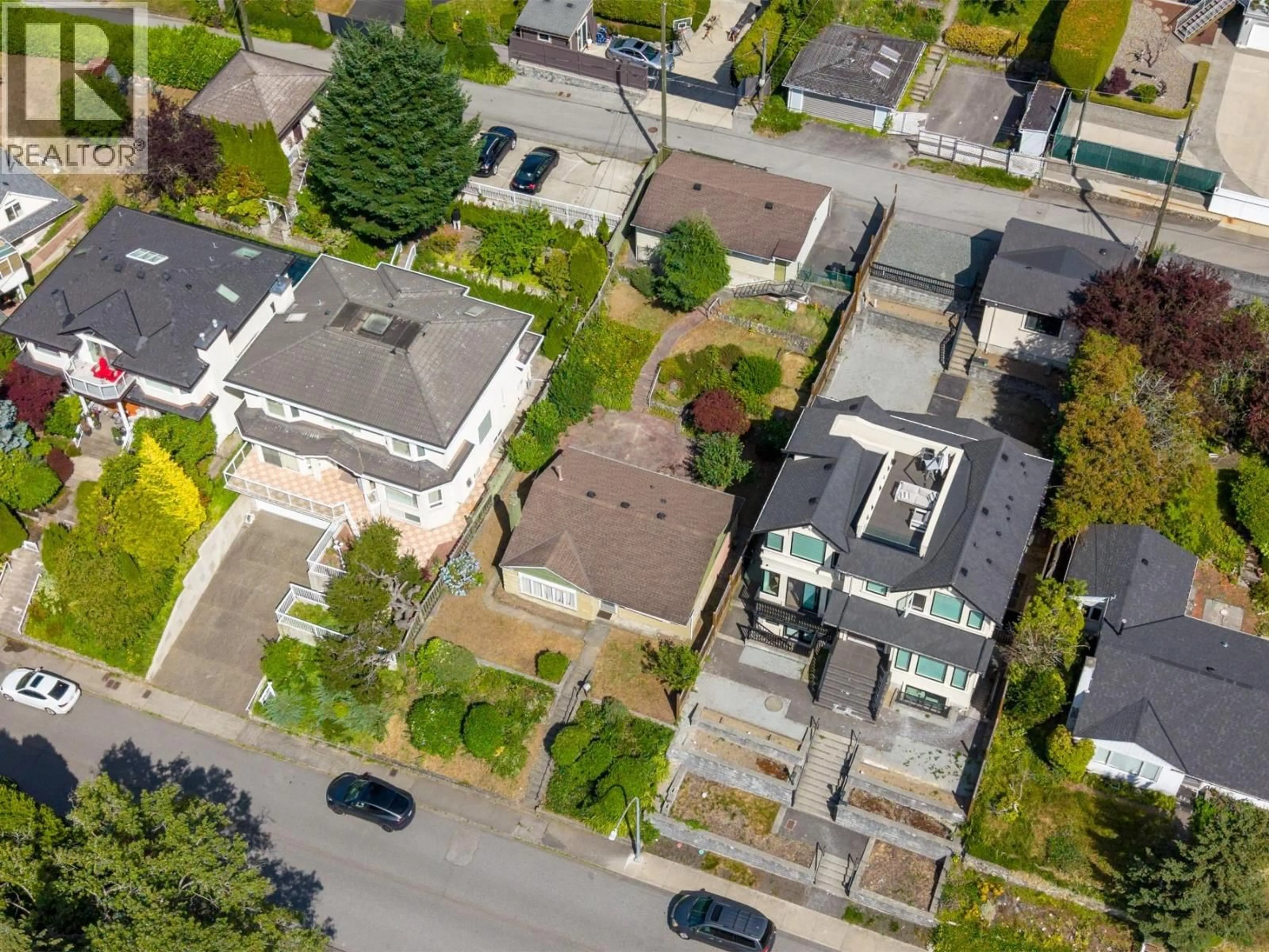 A pic from outside/outdoor area/front of a property/back of a property/a pic from drone, street for 7280 BARNET ROAD, Burnaby British Columbia V5A1E2