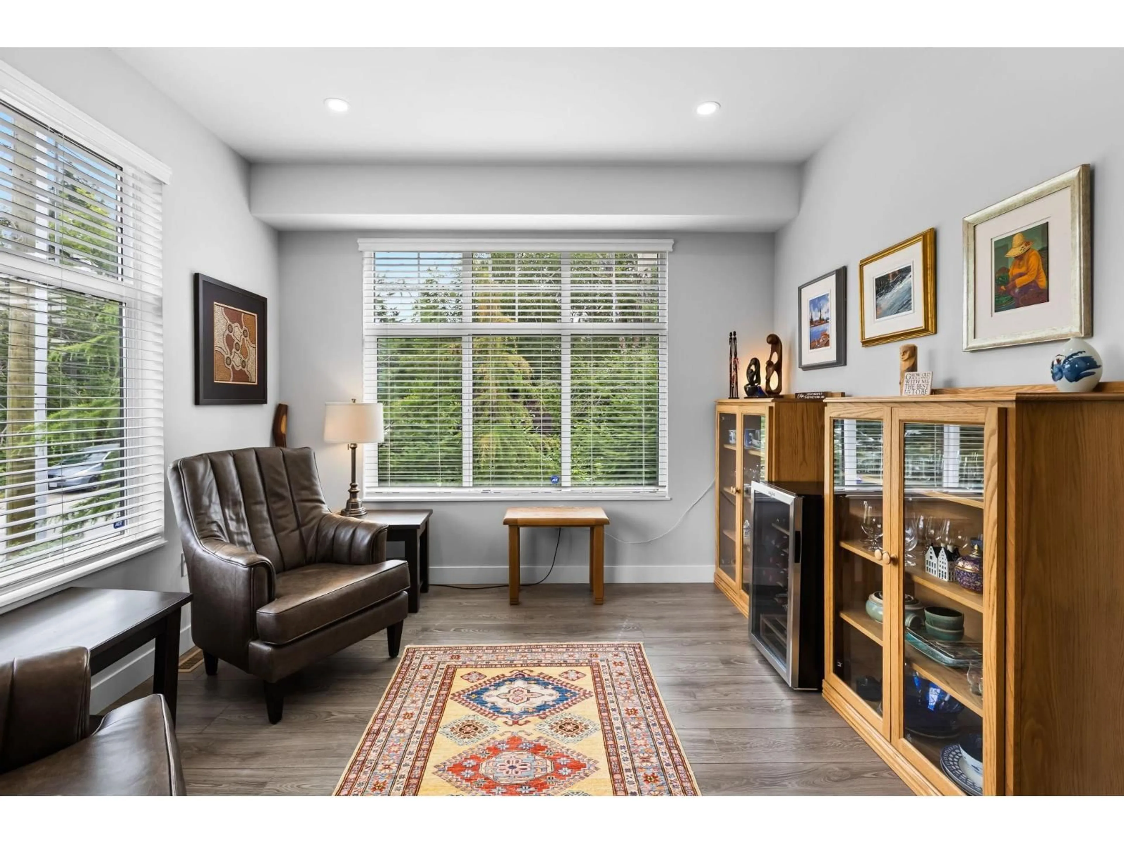 Living room with furniture, wood/laminate floor for 59 - 20327 72B AVENUE, Langley British Columbia V2Y4J6