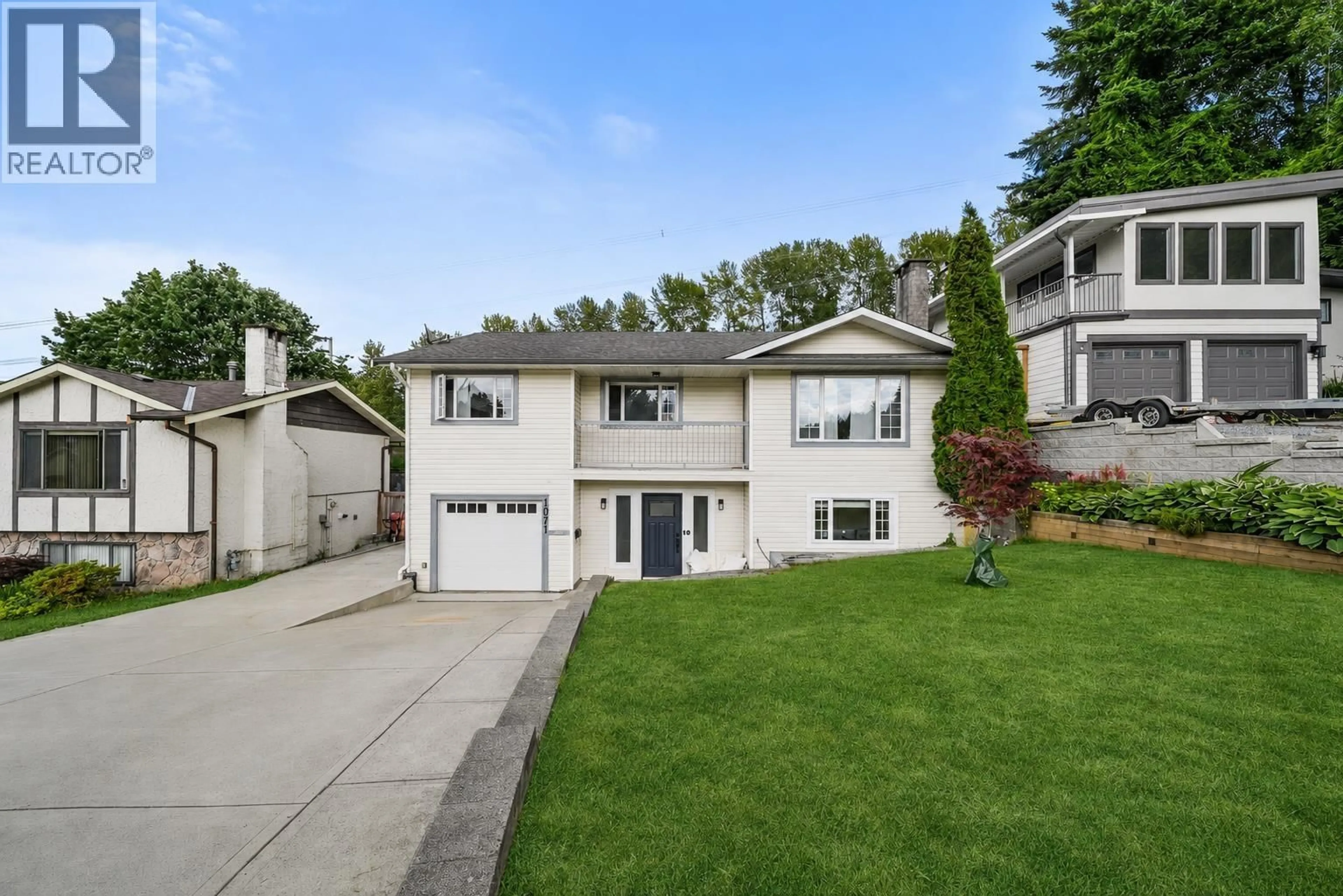 Home with vinyl exterior material, street for 1071 SPAR DRIVE, Coquitlam British Columbia V3H3H2