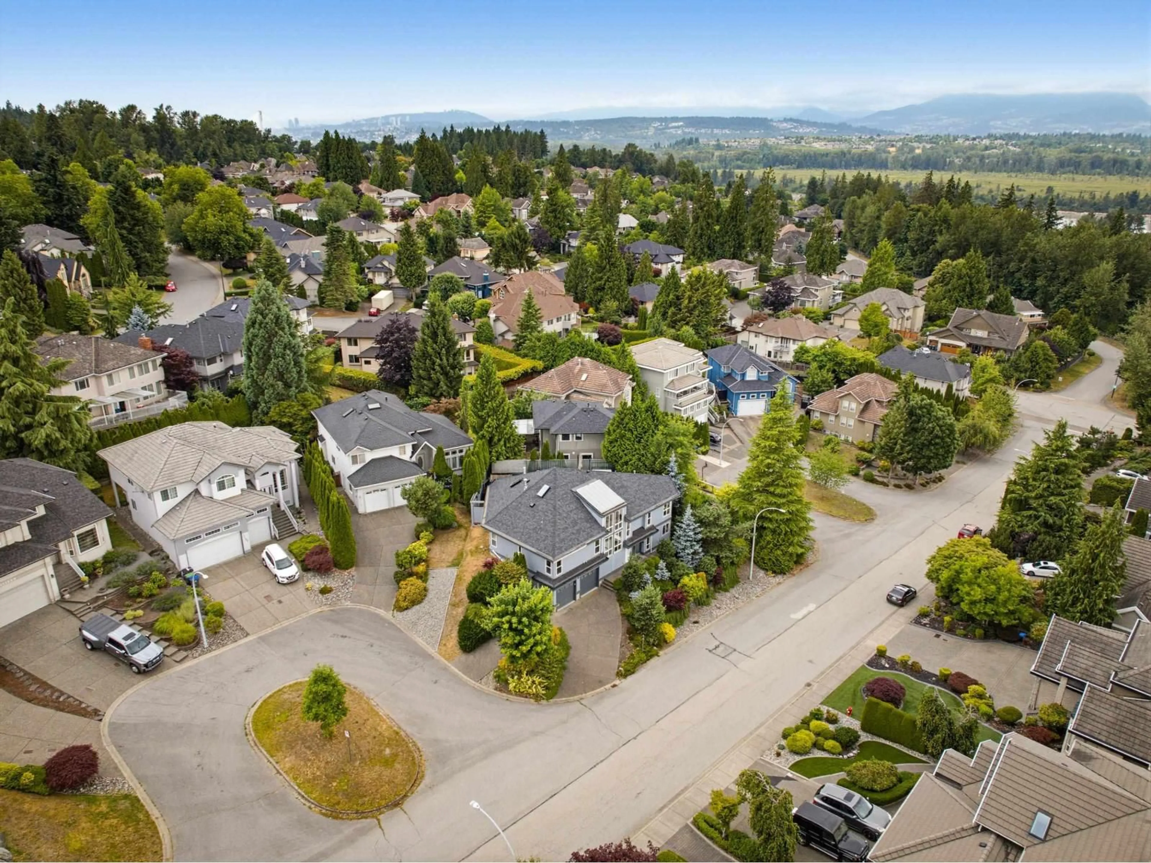 A pic from outside/outdoor area/front of a property/back of a property/a pic from drone, mountain view for 11151 164 STREET, Surrey British Columbia V4N4X9
