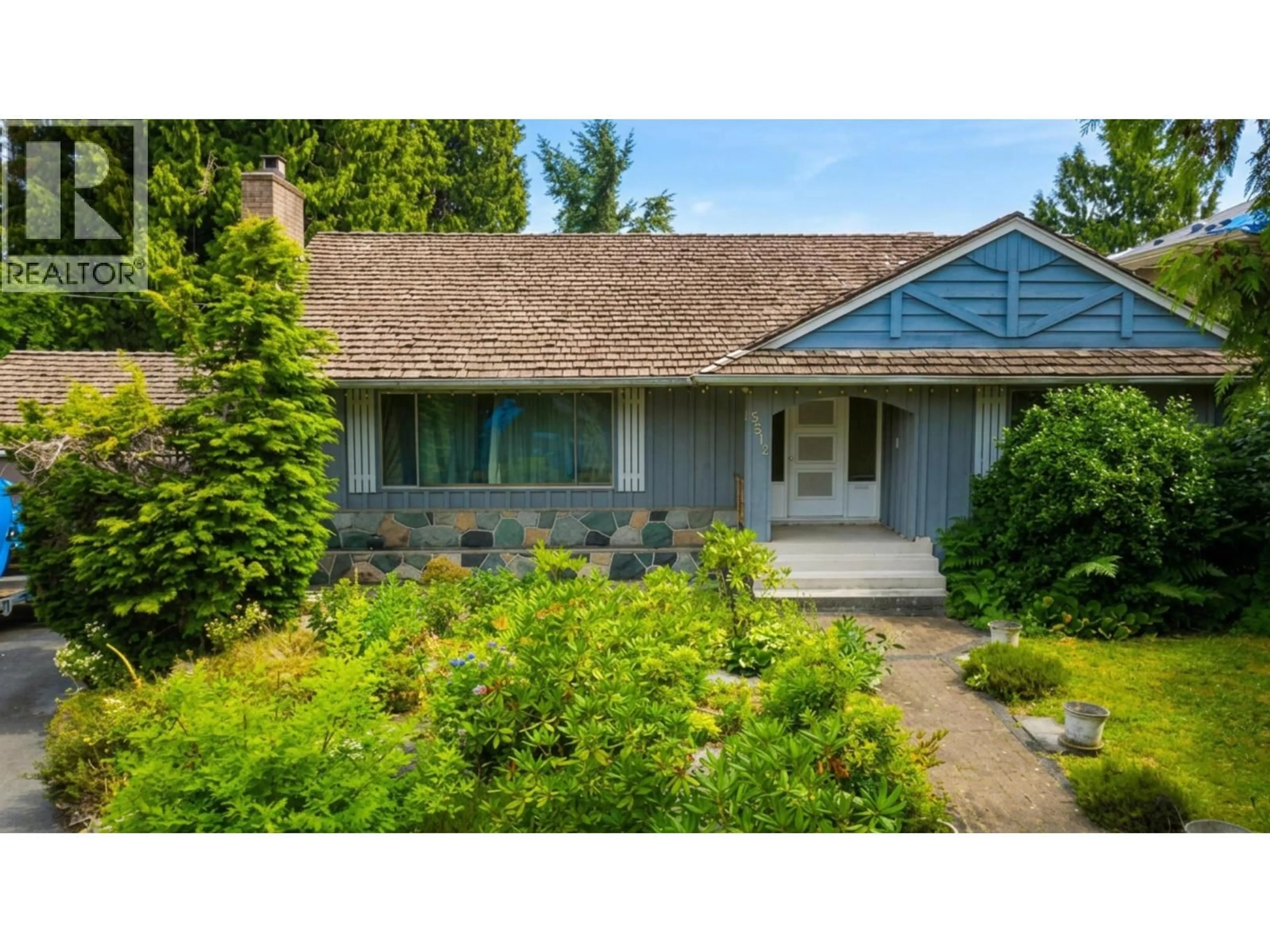 Home with vinyl exterior material, street for 5512 BUCKINGHAM AVENUE, Burnaby British Columbia V5E2A1