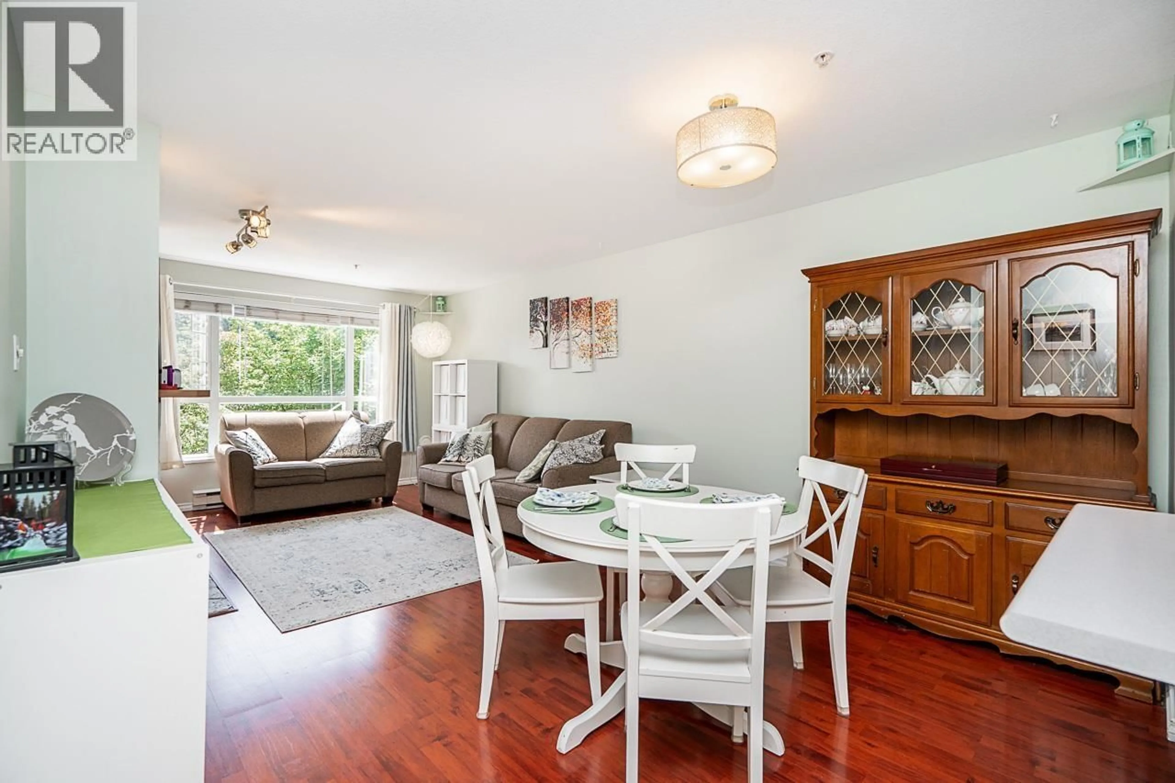 Dining room, wood/laminate floor for 206 - 2559 PARKVIEW LANE, Port Coquitlam British Columbia V3C6M1