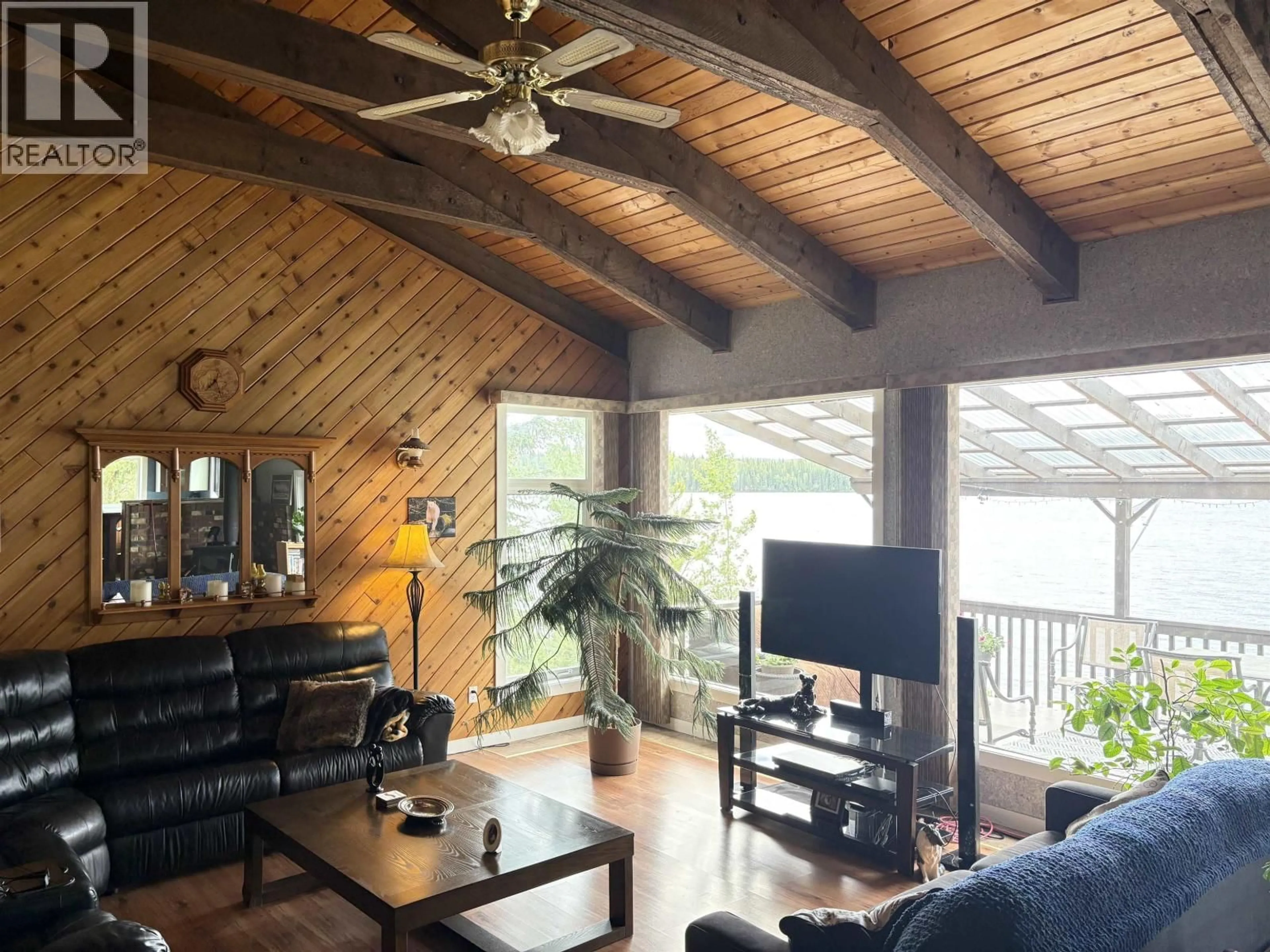 Living room with furniture, wood/laminate floor for 17048 NORMAN LAKE ROAD, Prince George British Columbia V2N6P4