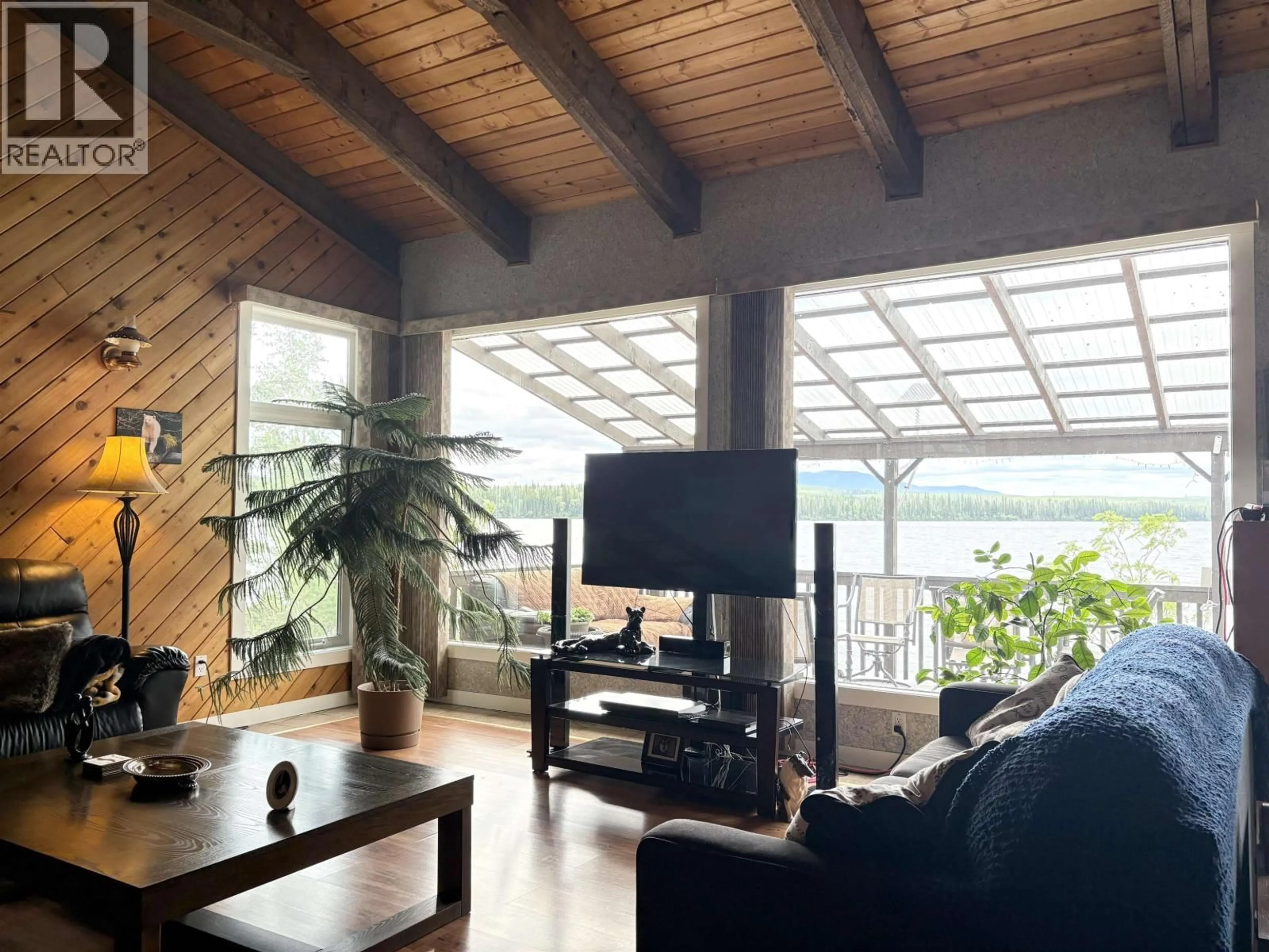 Living room with furniture, wood/laminate floor for 17048 NORMAN LAKE ROAD, Prince George British Columbia V2N6P4
