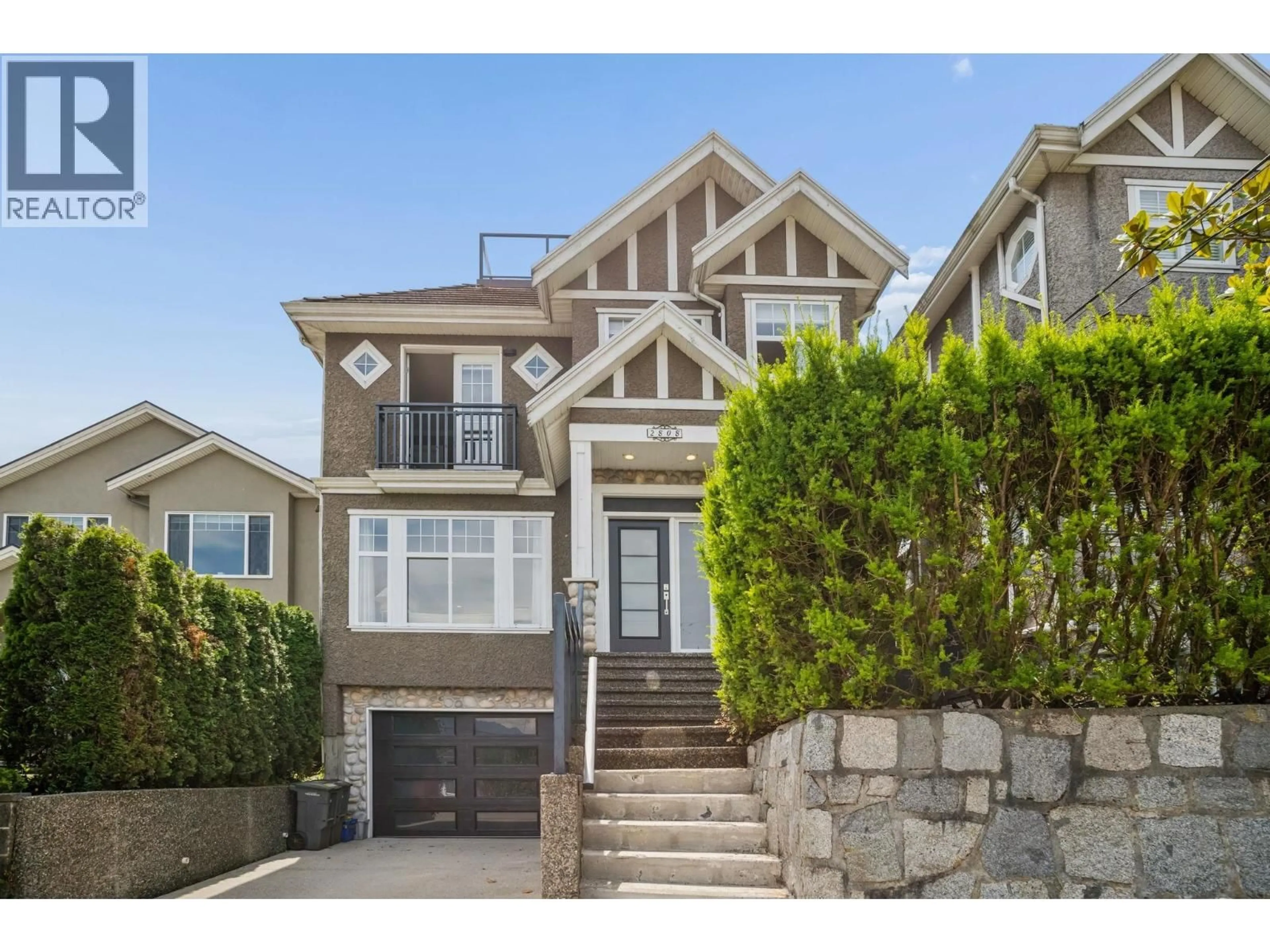 Home with vinyl exterior material, street for 2808 WALL STREET, Vancouver British Columbia V5K1B2
