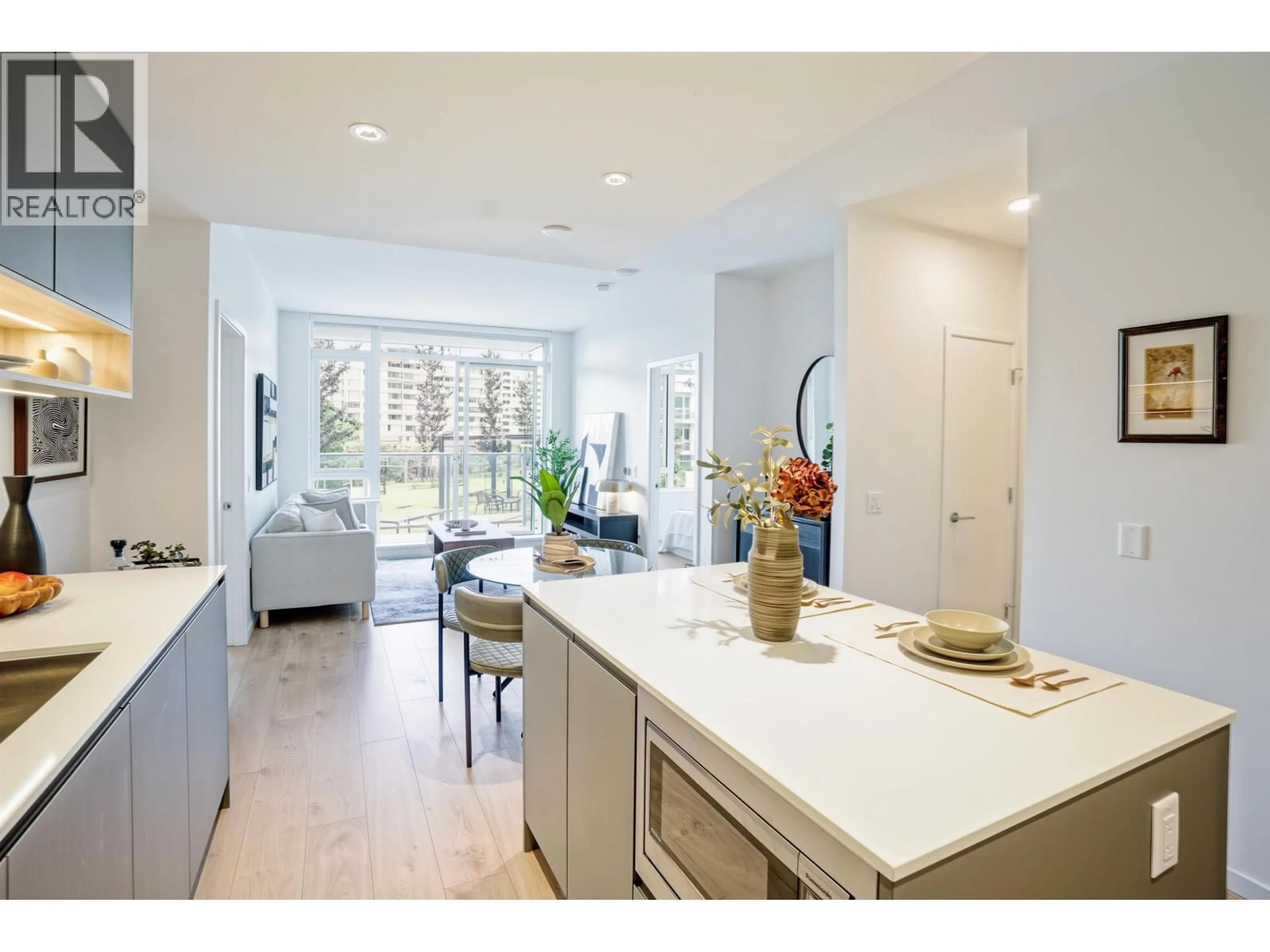Open concept kitchen, ceramic/tile floor for 320 - 6808 MINORU BOULEVARD, Richmond British Columbia V6Y0M7