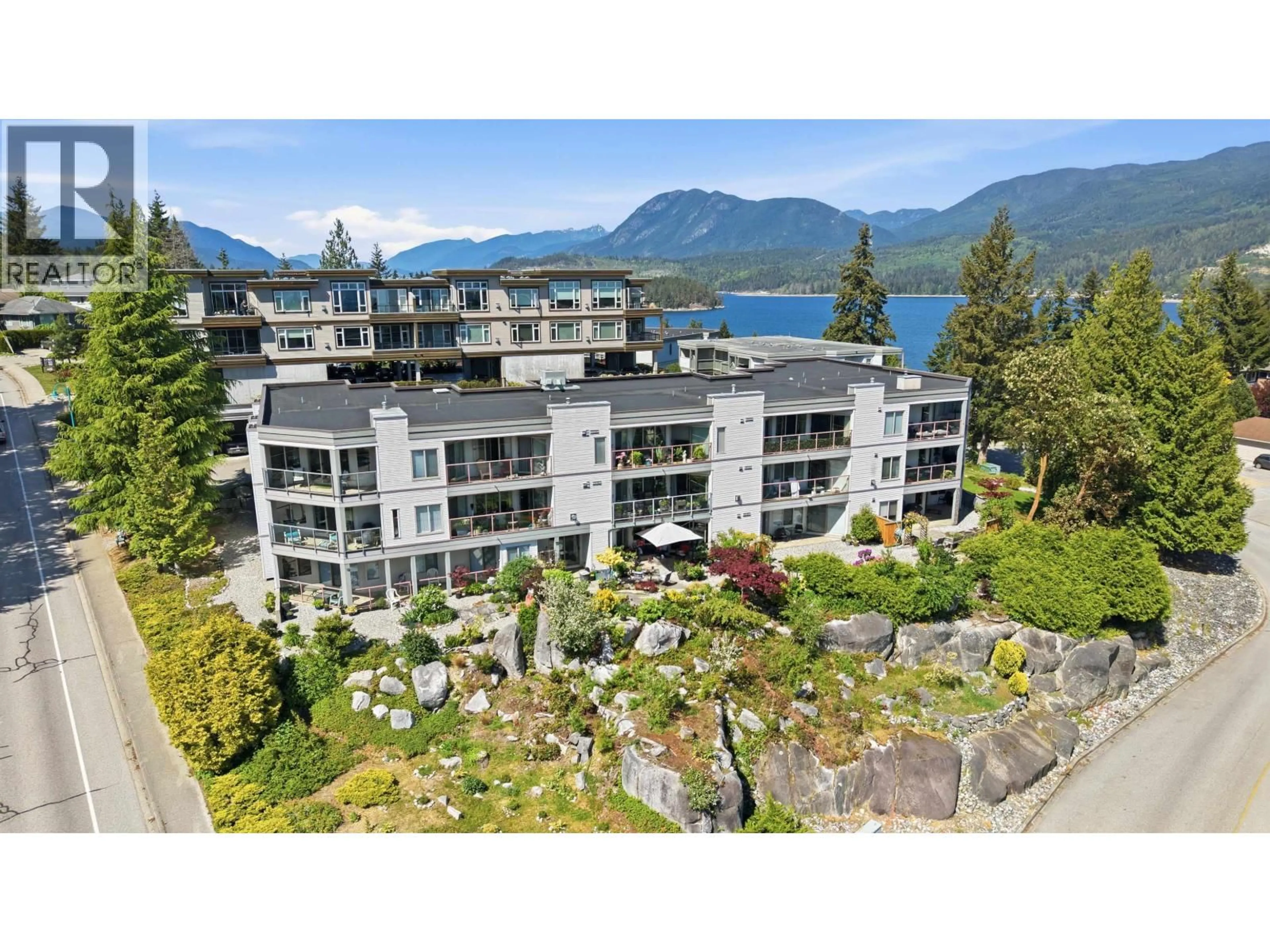 A pic from outside/outdoor area/front of a property/back of a property/a pic from drone, water/lake/river/ocean view for 302 - 5780 TRAIL AVENUE, Sechelt British Columbia V7Z0K5