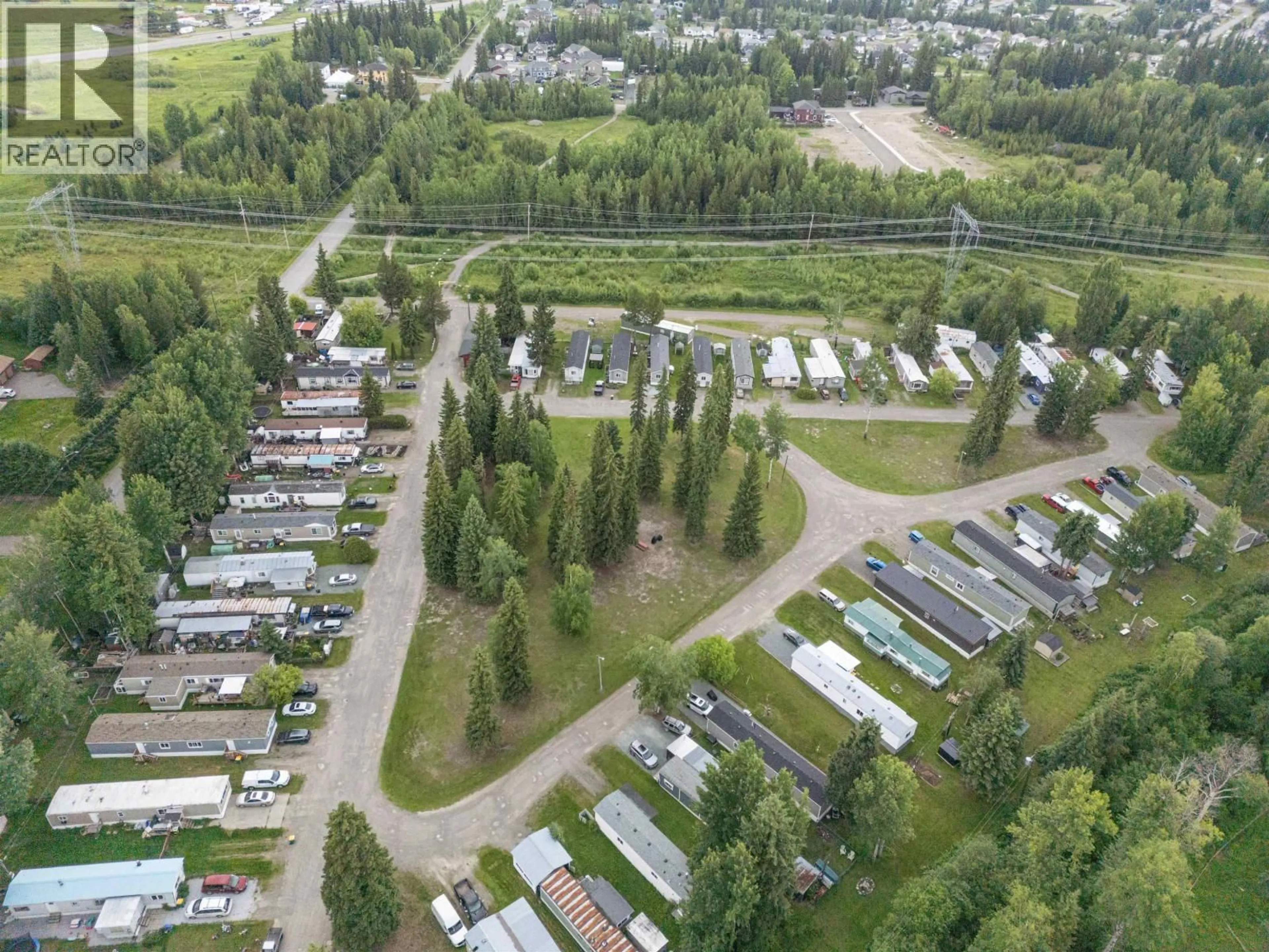 A pic from outside/outdoor area/front of a property/back of a property/a pic from drone, street for 13 - 8474 BUNCE ROAD, Prince George British Columbia V2N6P1