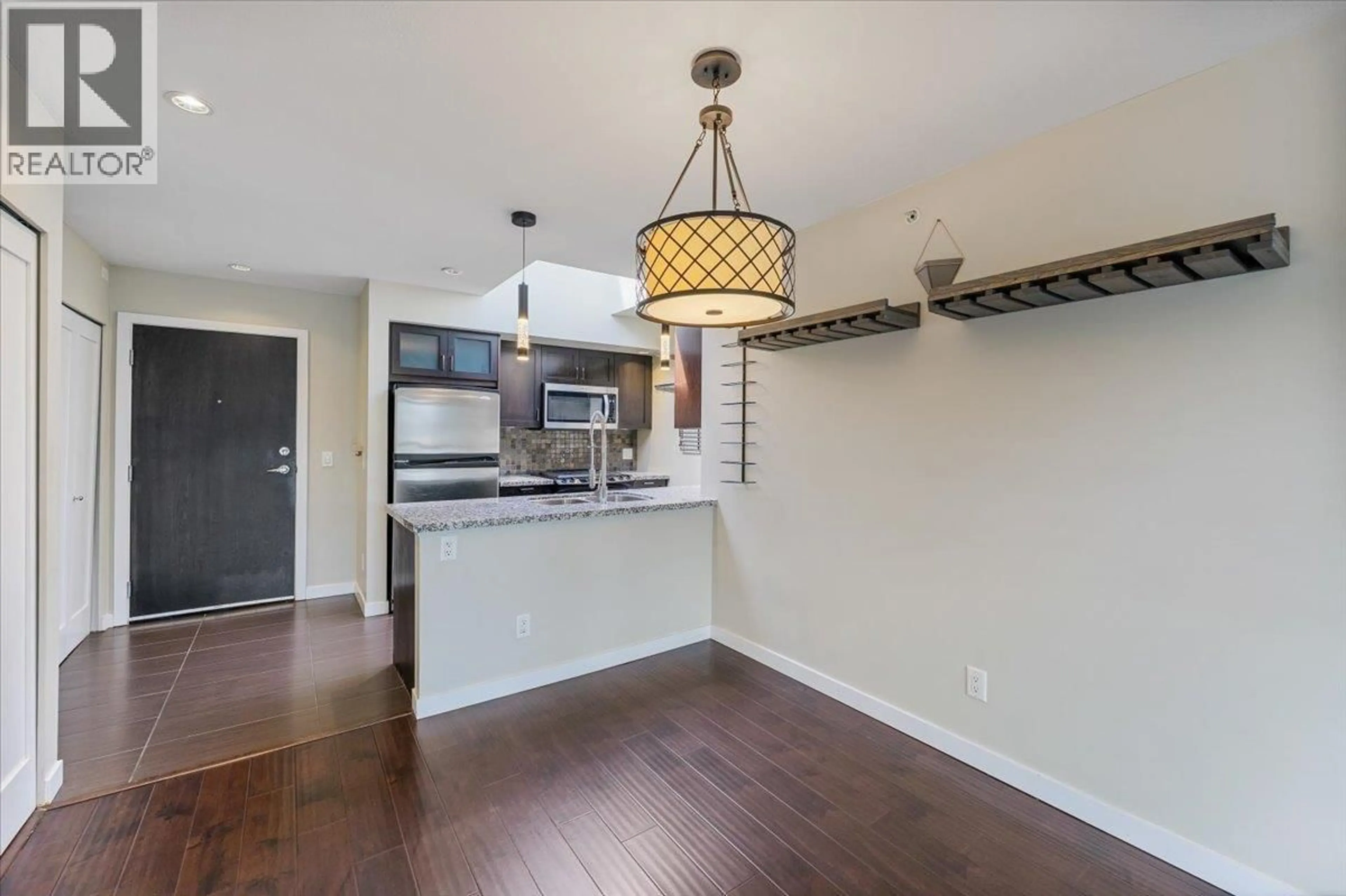 Open concept kitchen, wood/laminate floor for 411 - 405 SKEENA STREET, Vancouver British Columbia V5K0A3