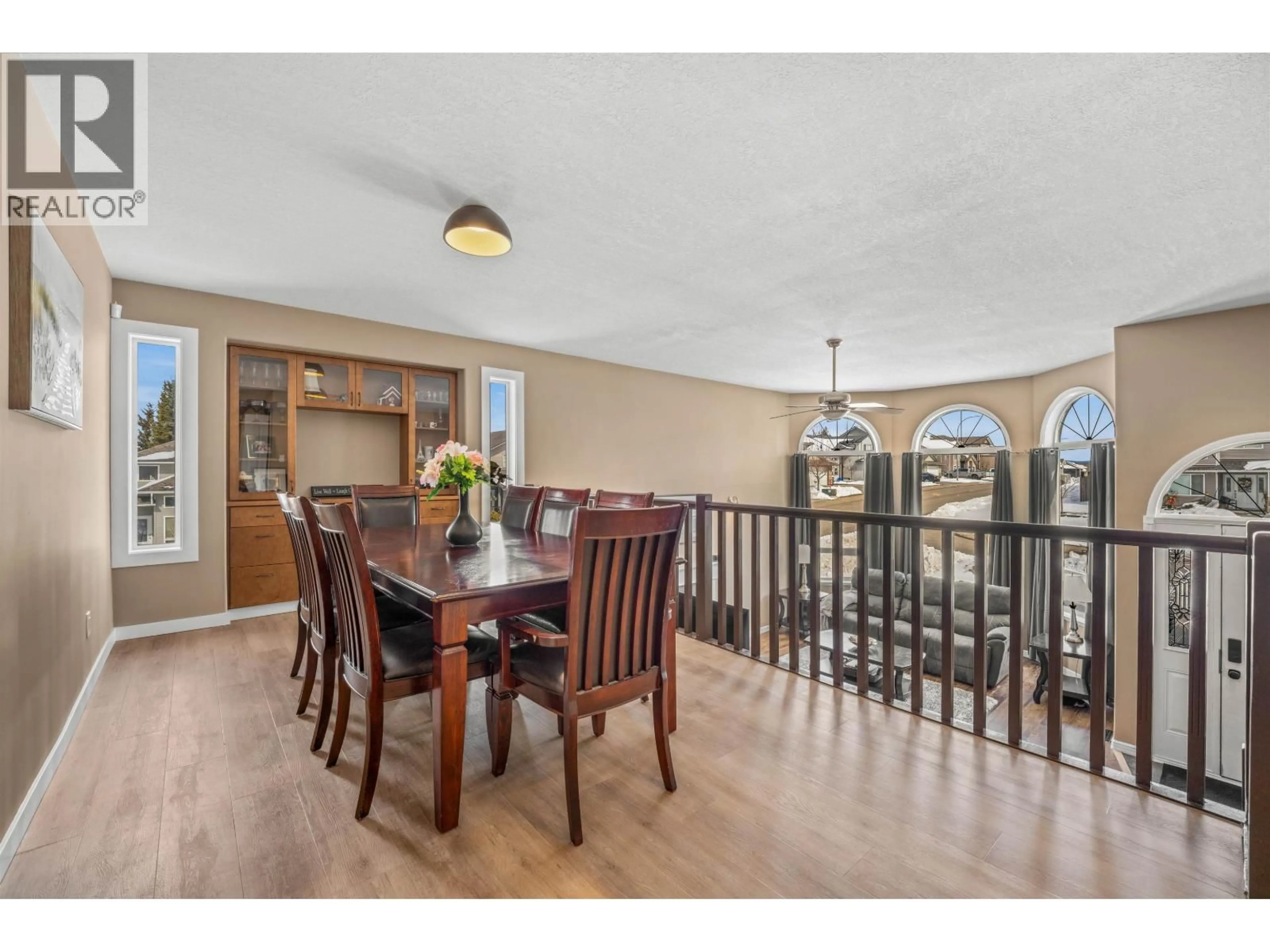 Dining room, wood/laminate floor for 7003 TRYGG COURT, Prince George British Columbia V2N6Z8