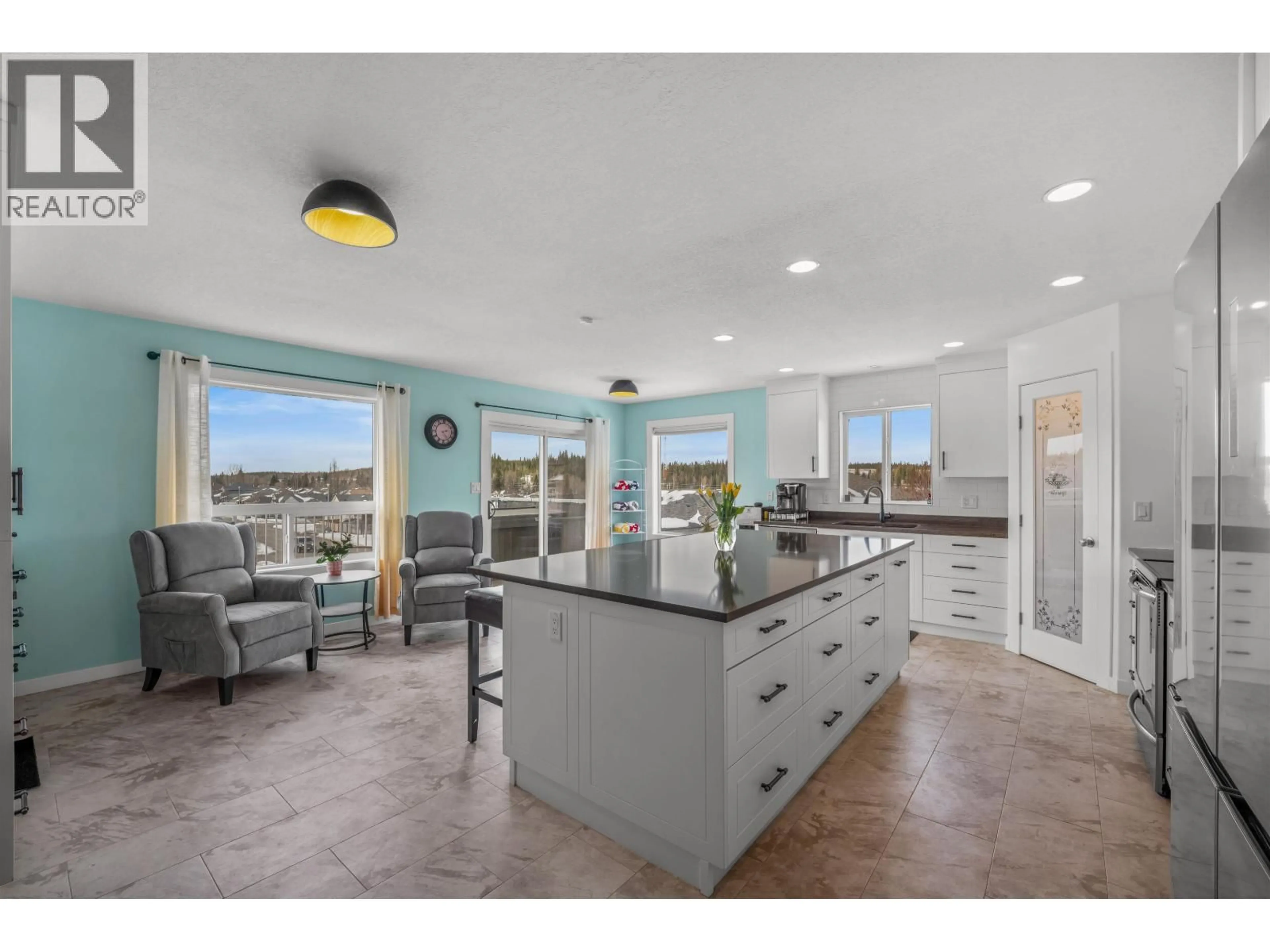 Open concept kitchen, ceramic/tile floor for 7003 TRYGG COURT, Prince George British Columbia V2N6Z8