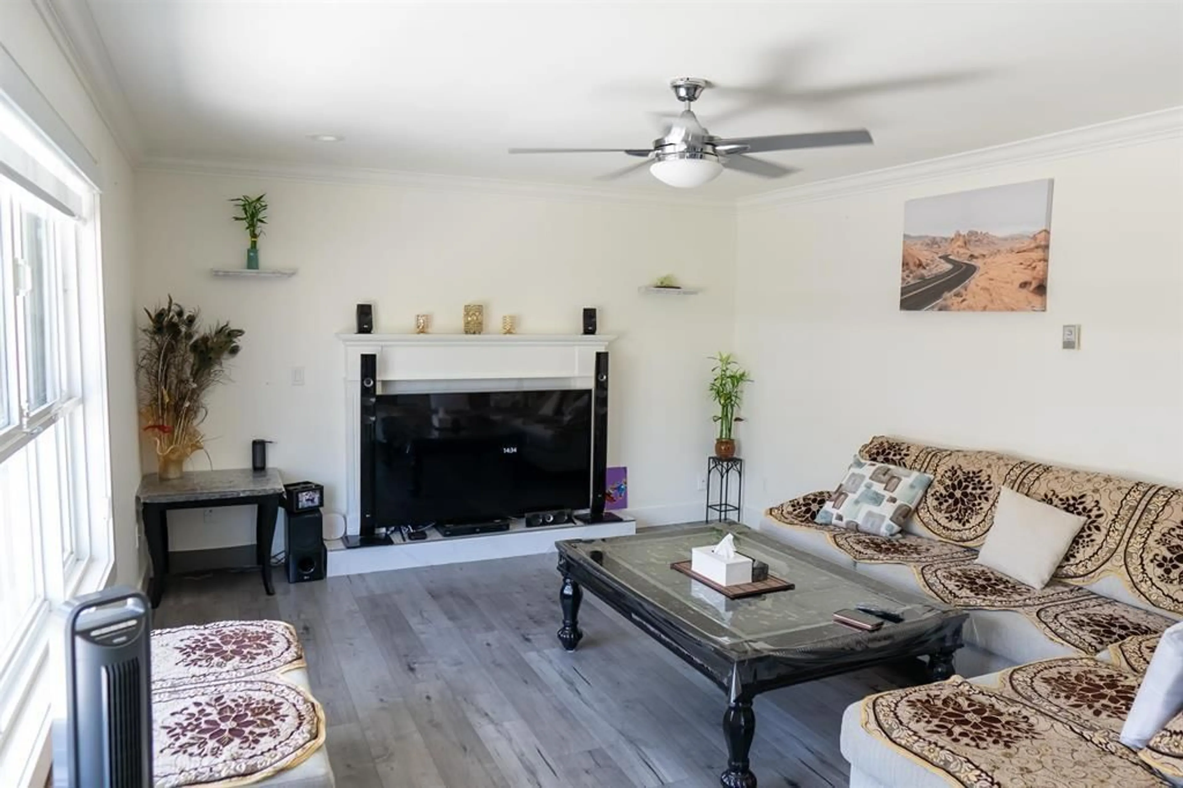 Living room with furniture, wood/laminate floor for 6340 125A STREET, Surrey British Columbia V3X3N1