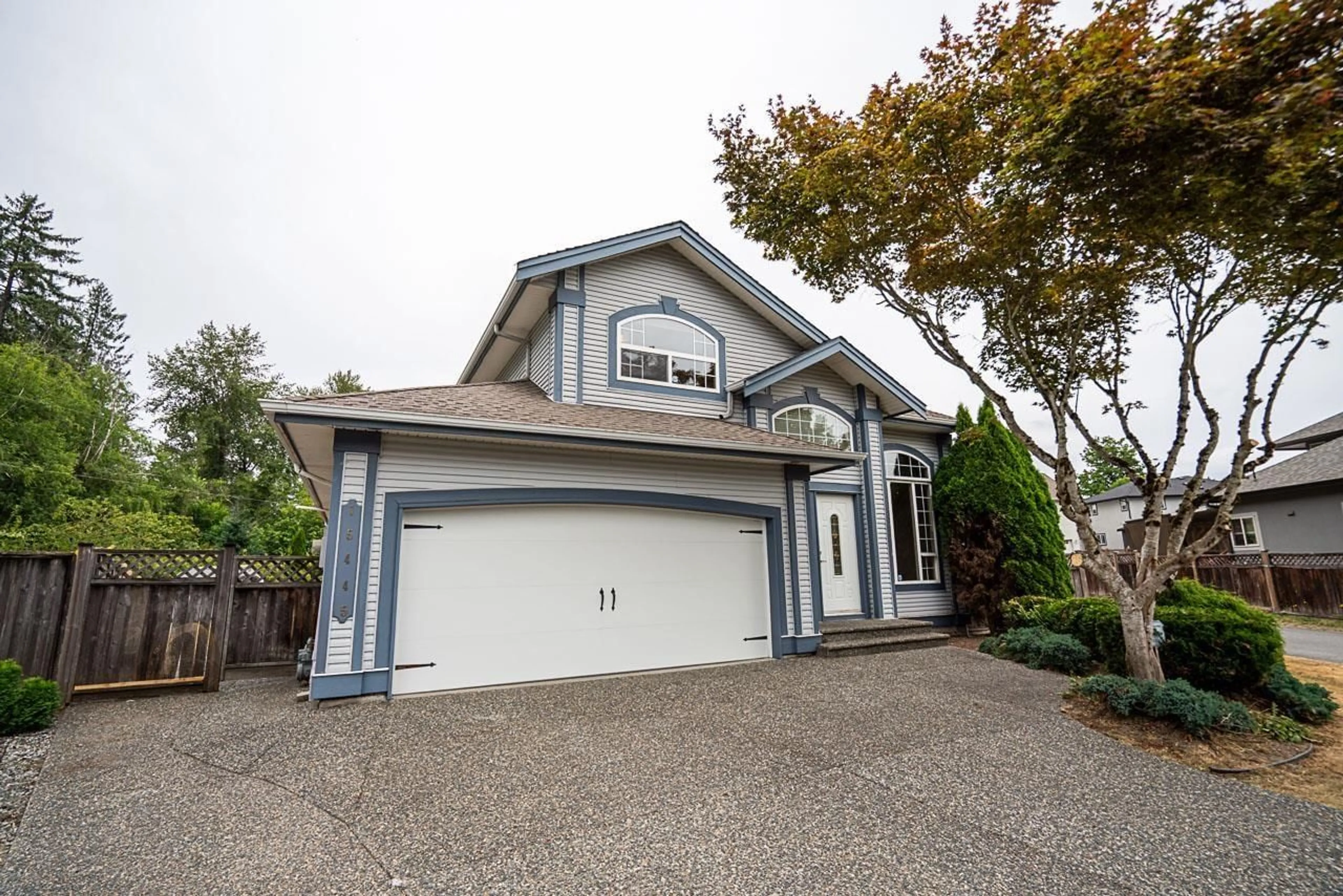 Home with vinyl exterior material, street for 15445 109A AVENUE, Surrey British Columbia V3R0X6