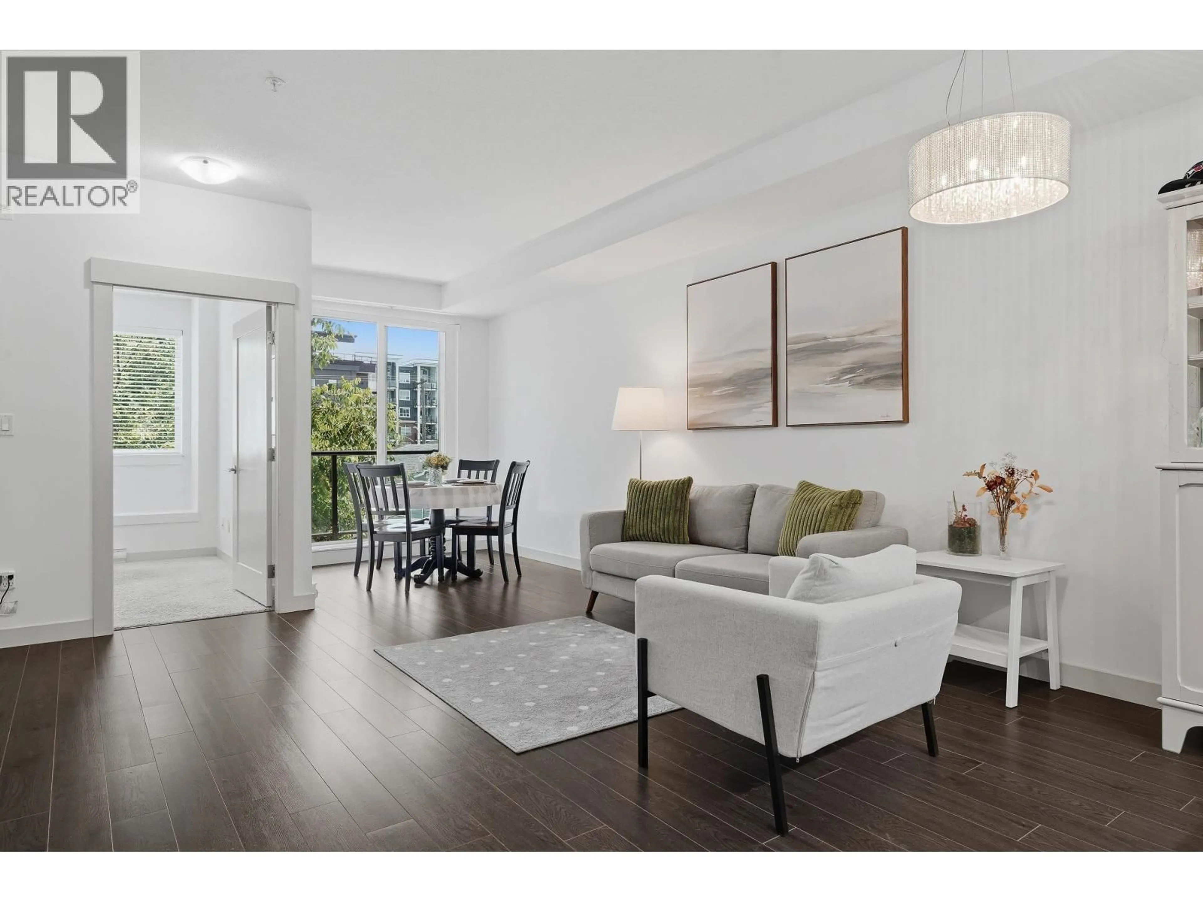 Living room with furniture, wood/laminate floor for 206 - 2214 KELLY AVENUE, Port Coquitlam British Columbia V3C0E5
