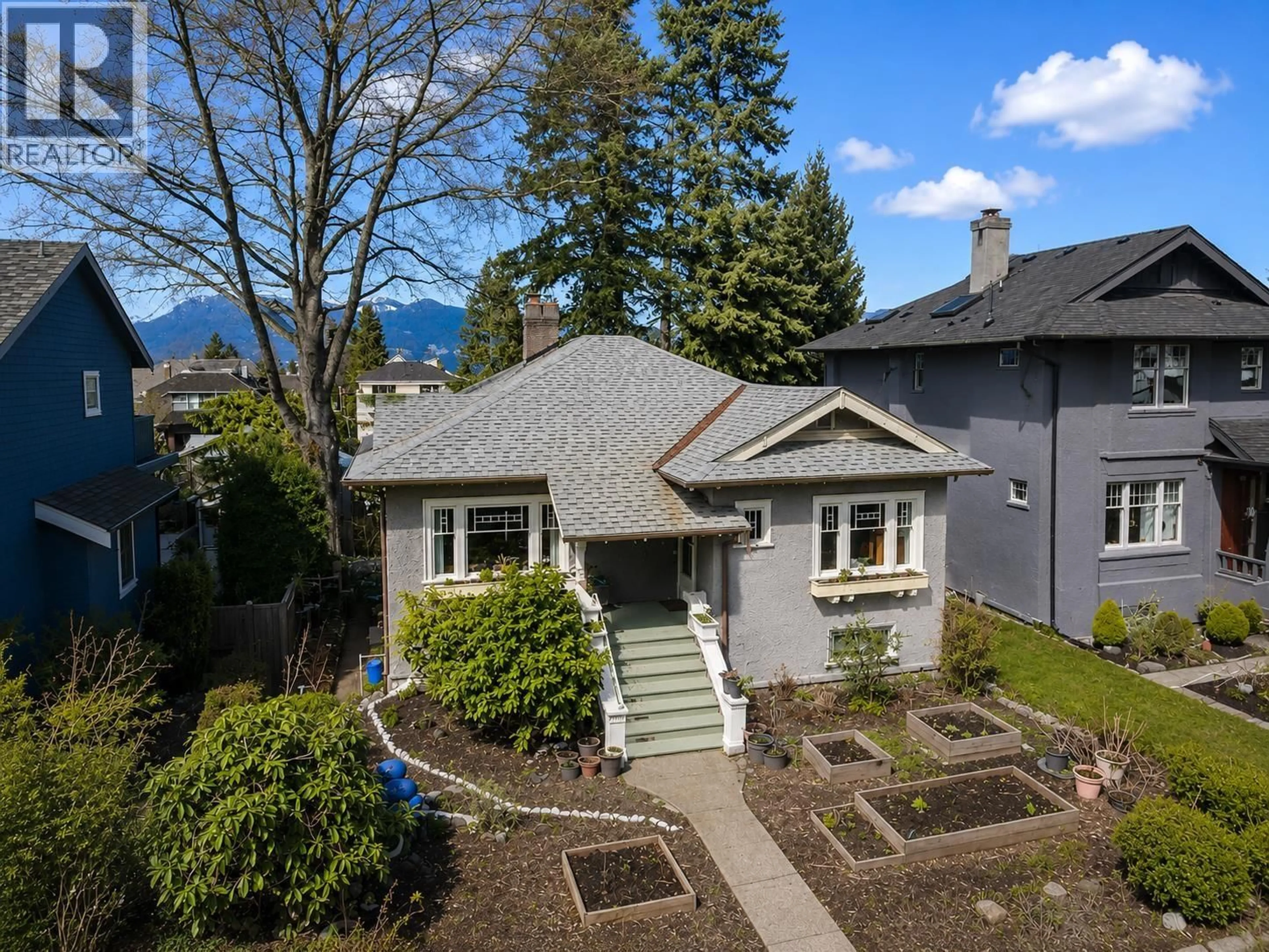A pic from outside/outdoor area/front of a property/back of a property/a pic from drone, street for 4247 13TH AVENUE, Vancouver British Columbia V6R2T7