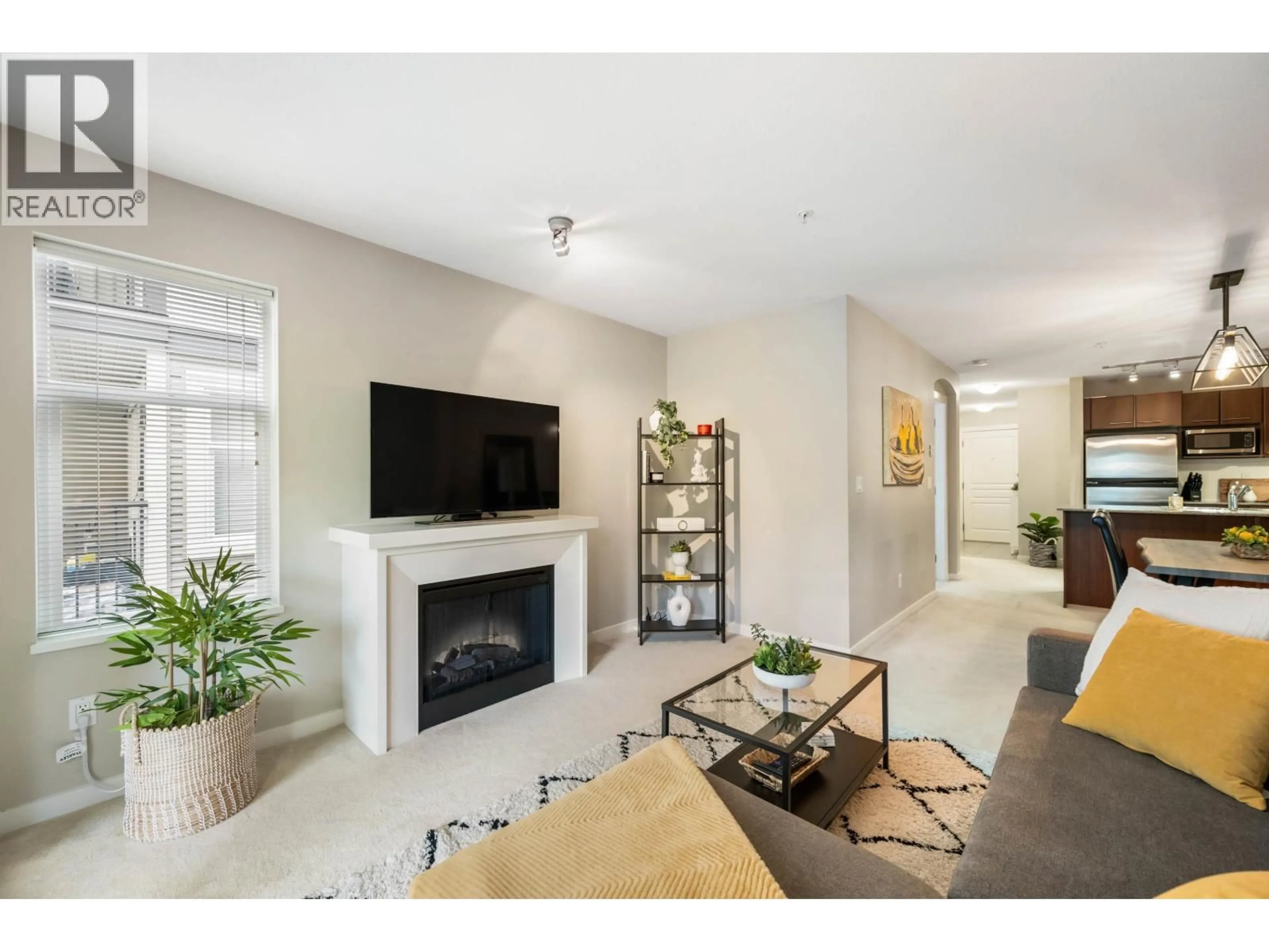Living room with furniture, unknown for 317 - 4799 BRENTWOOD DRIVE, Burnaby British Columbia V5C0C4