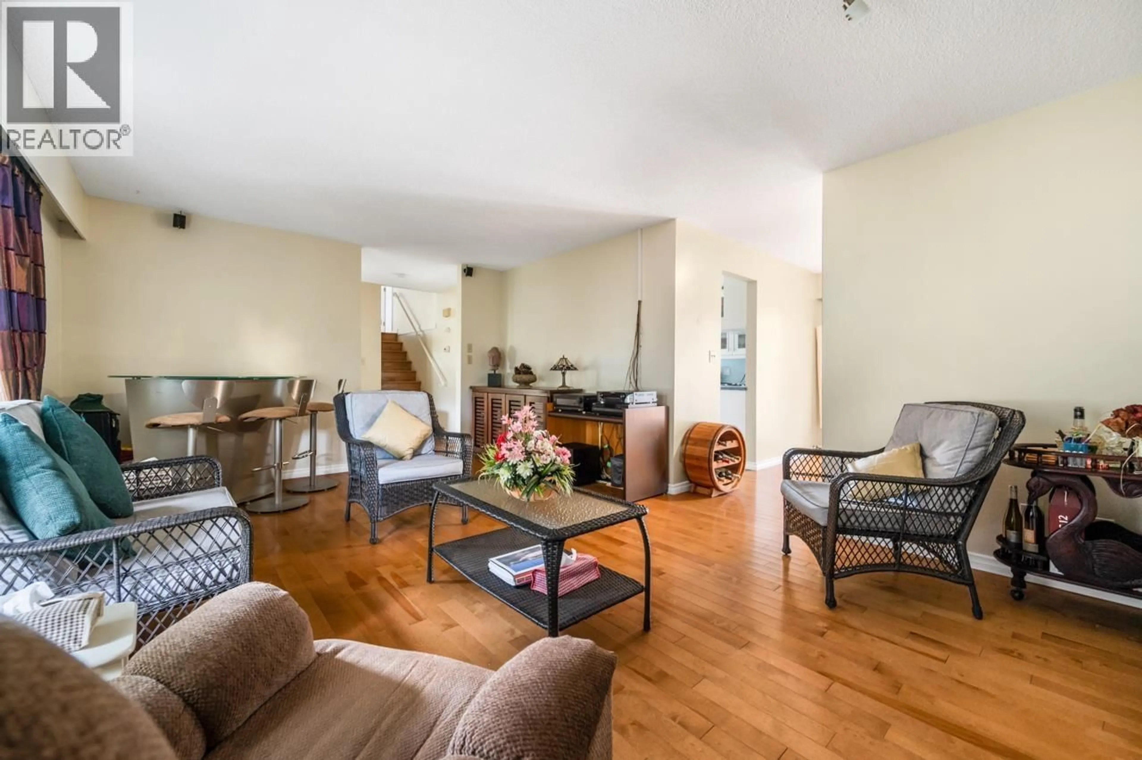 Living room with furniture, wood/laminate floor for 3431 SOLWAY DRIVE, Richmond British Columbia V7E3T4