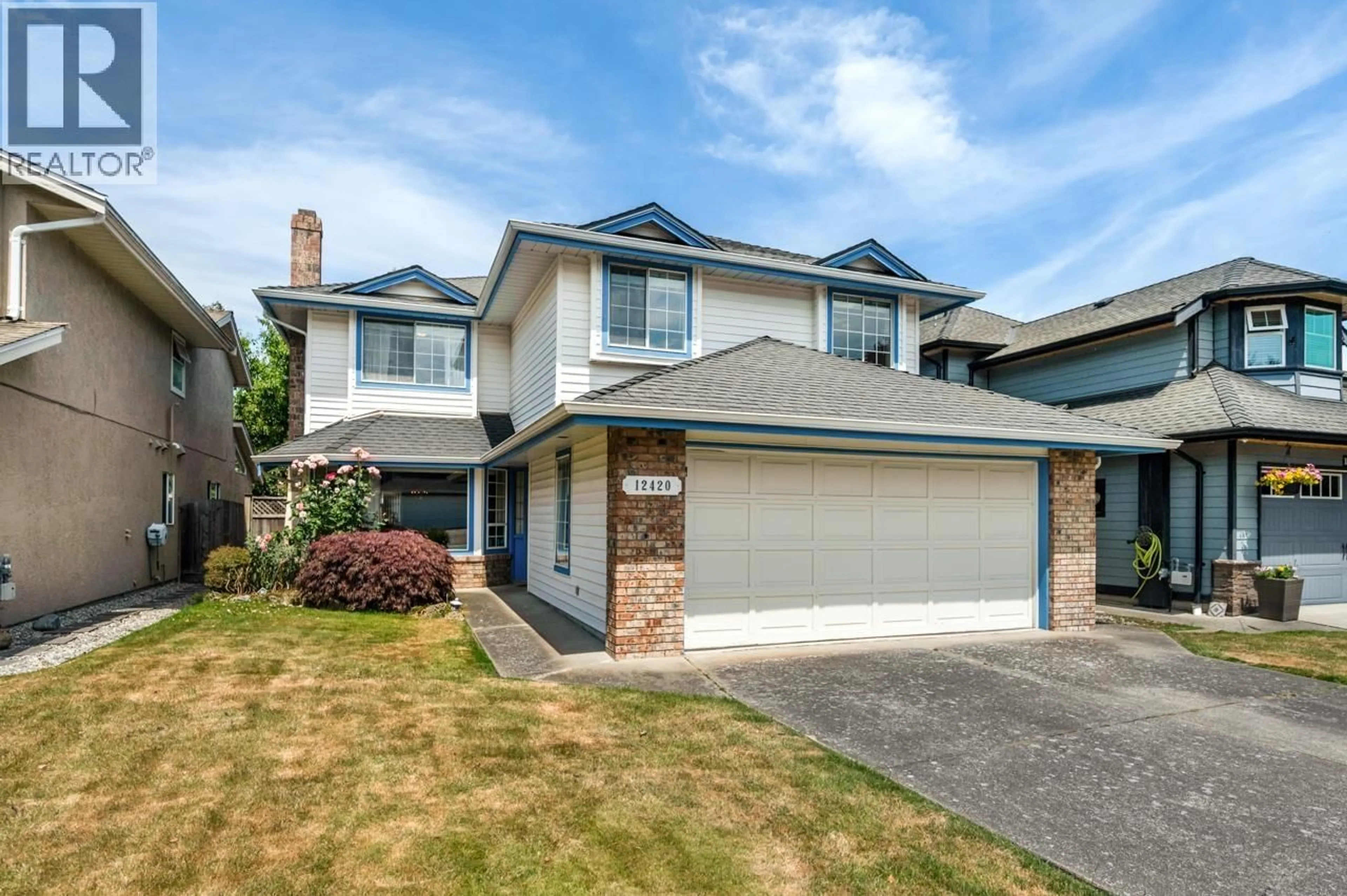 Home with vinyl exterior material, street for 12420 PHOENIX DRIVE, Richmond British Columbia V7E6B3