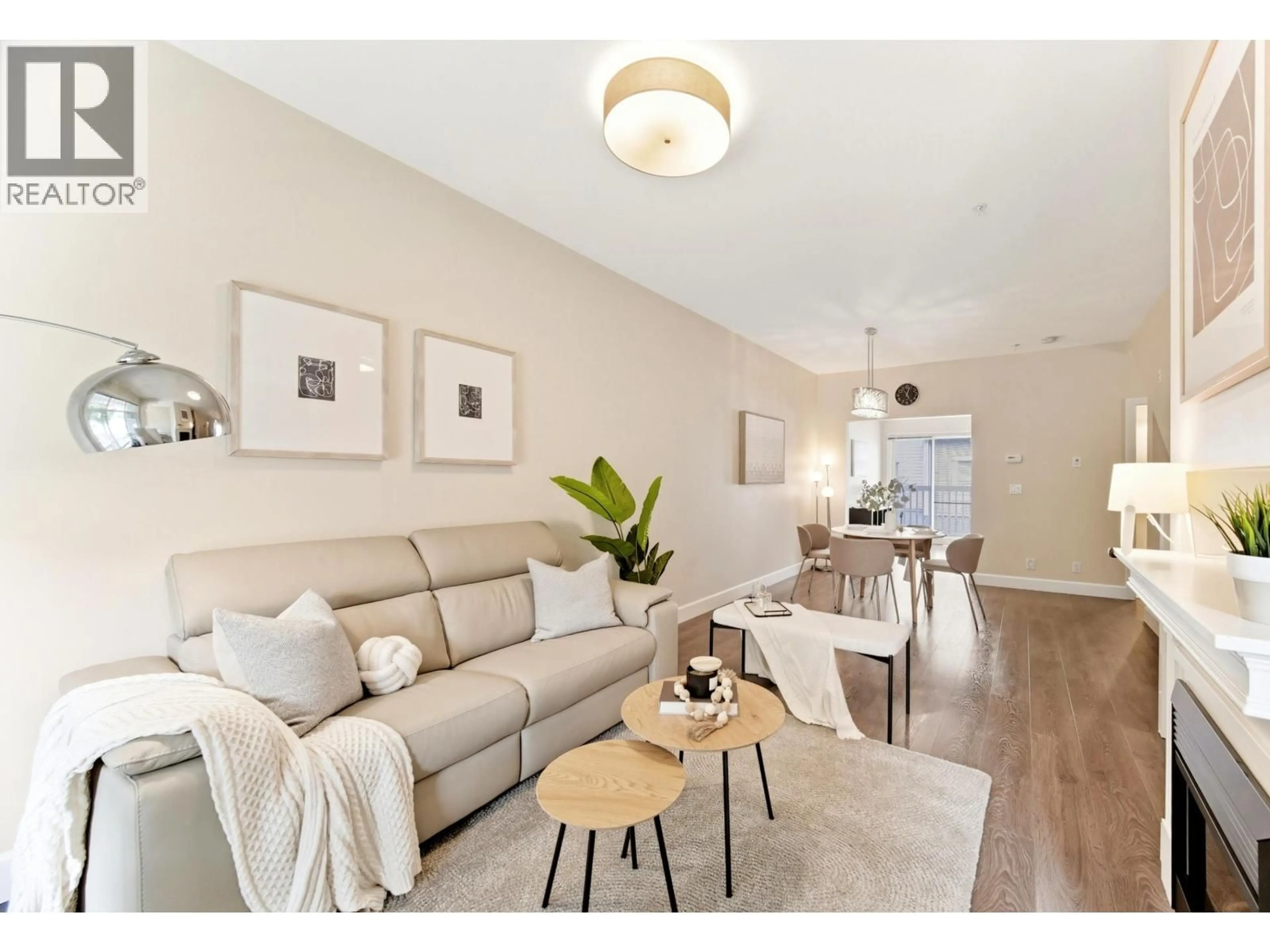 Living room with furniture, wood/laminate floor for 22 - 12333 ENGLISH AVENUE, Richmond British Columbia V7E6T2