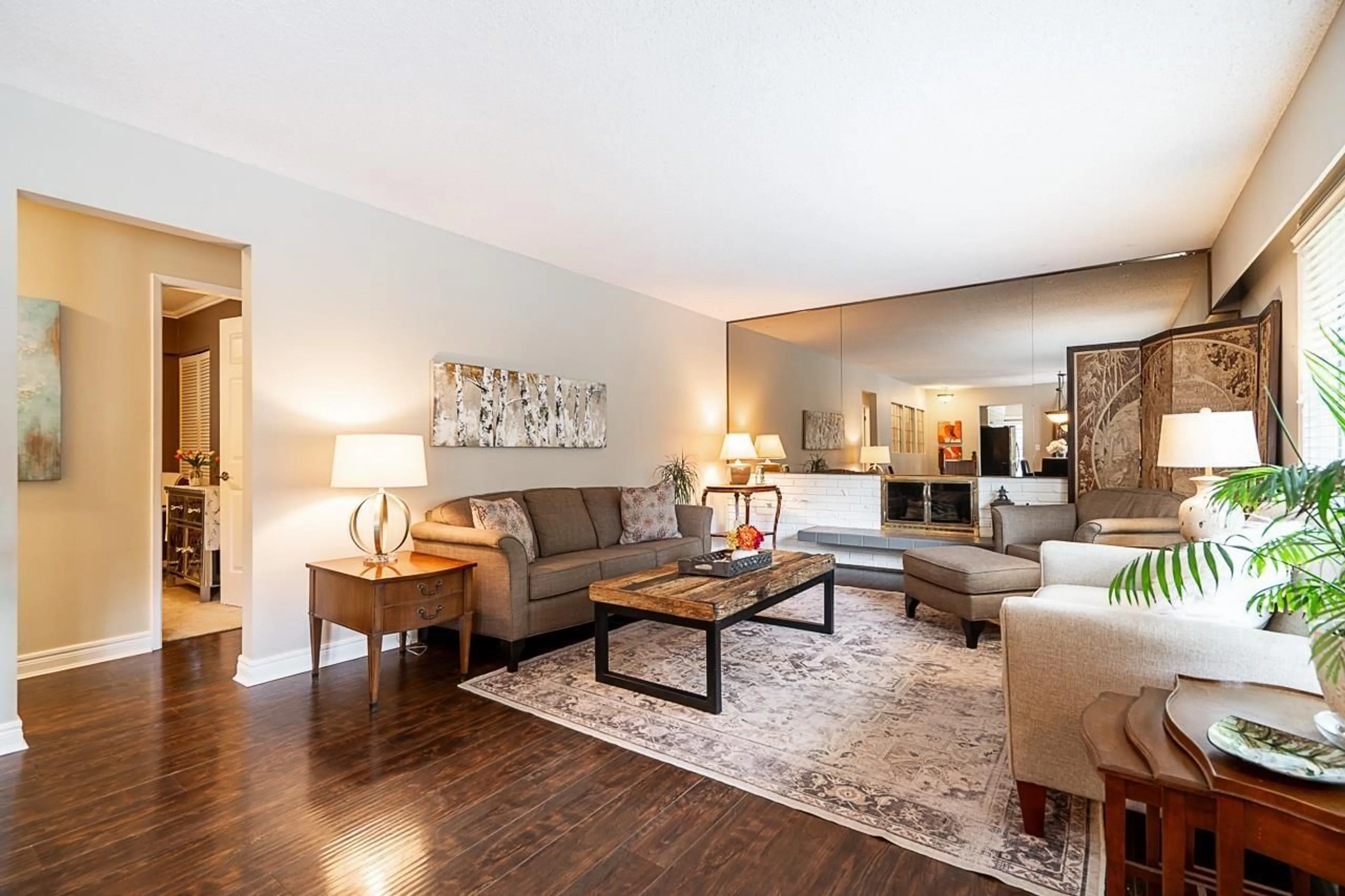 Living room with furniture, wood/laminate floor for 8652 SUNBURY PLACE, Delta British Columbia V4C3Y7