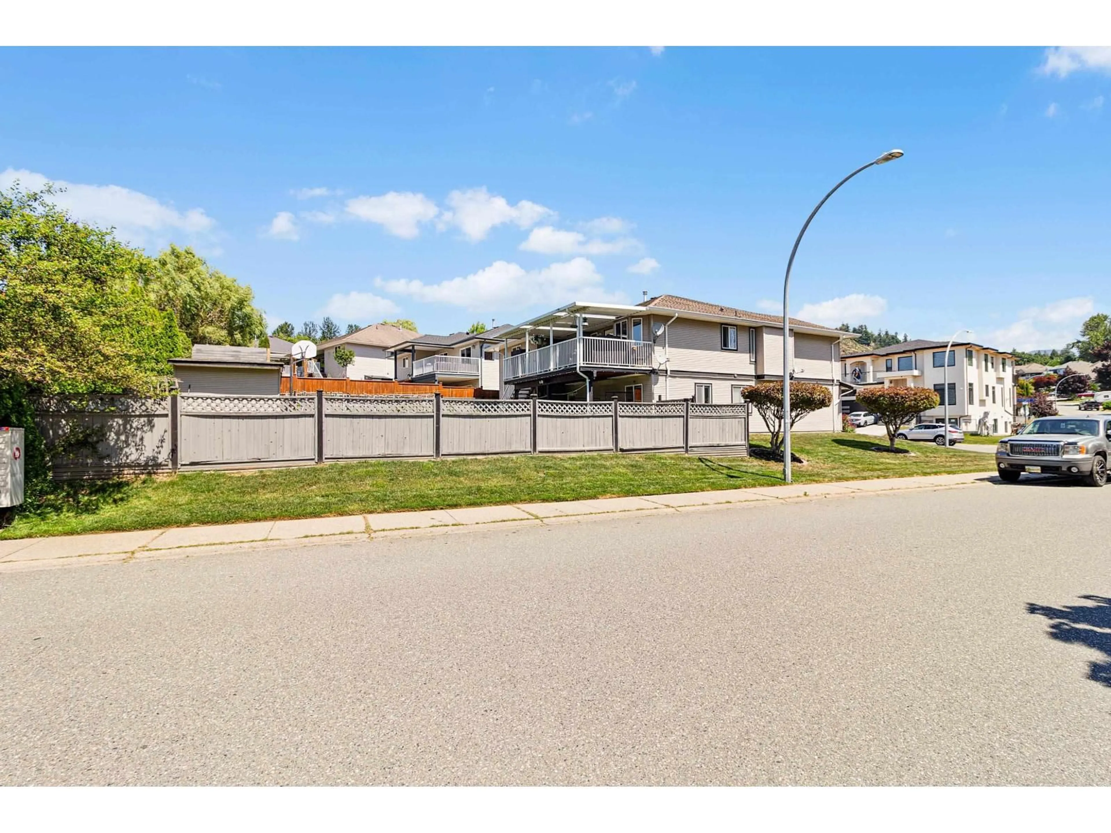 A pic from outside/outdoor area/front of a property/back of a property/a pic from drone, street for 7977 D'HERBOMEZ DRIVE, Mission British Columbia V2V7B5