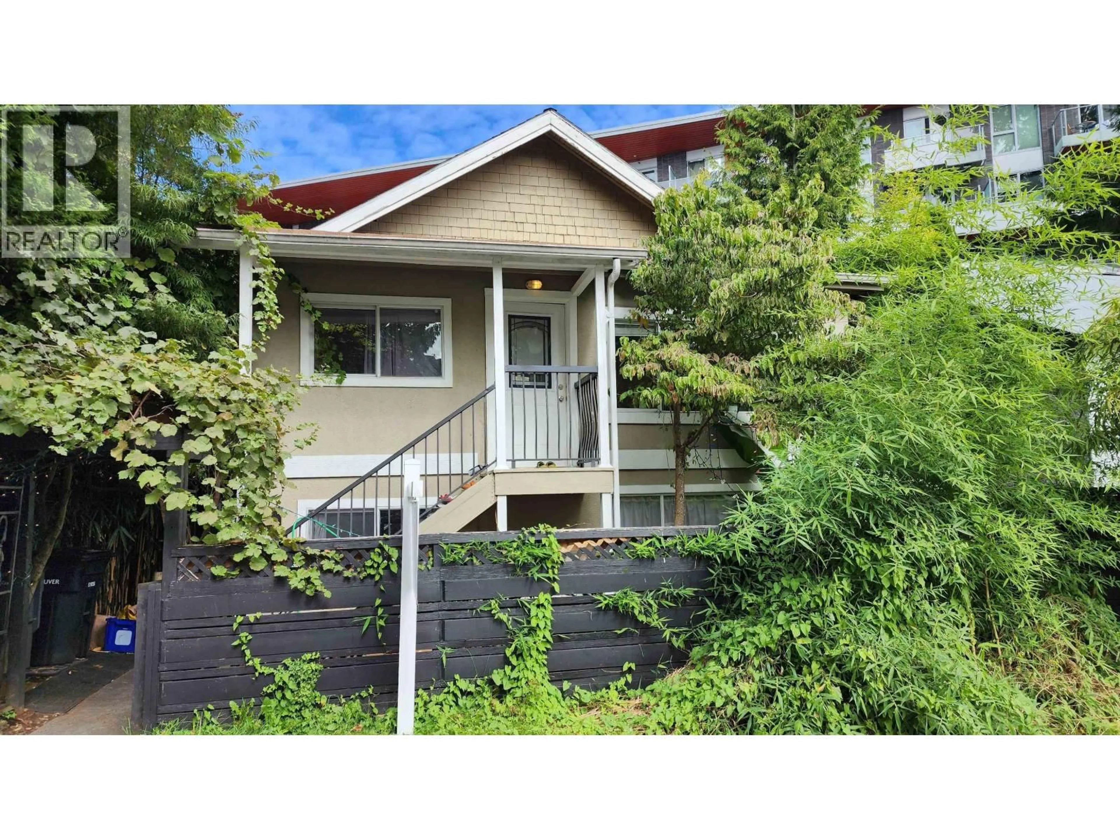 Home with vinyl exterior material, street for 1577 26TH AVENUE, Vancouver British Columbia V5N2W1