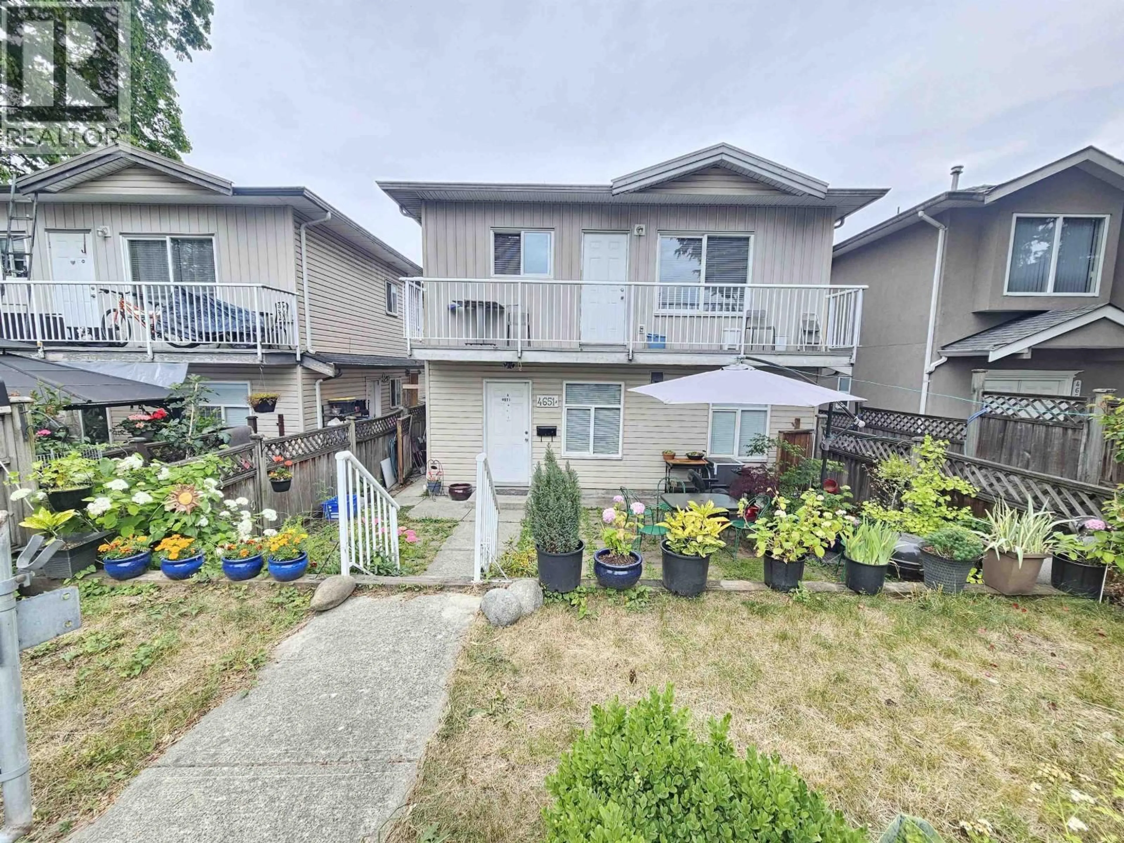 A pic from outside/outdoor area/front of a property/back of a property/a pic from drone, street for 4651 A CANADA WAY, Burnaby British Columbia V5G1K9