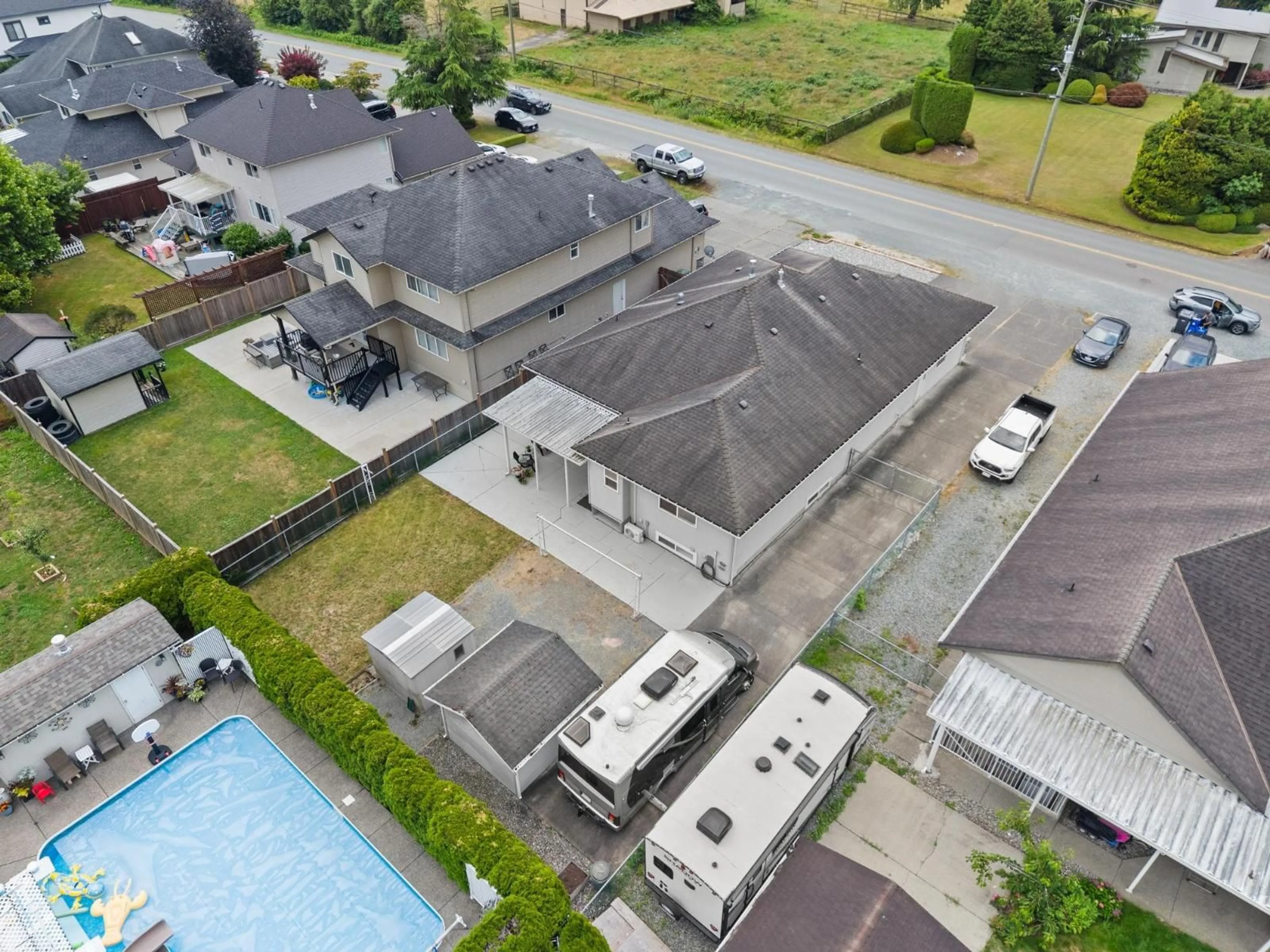 A pic from outside/outdoor area/front of a property/back of a property/a pic from drone, building for 27015 24 AVENUE, Langley British Columbia V4W2Y9