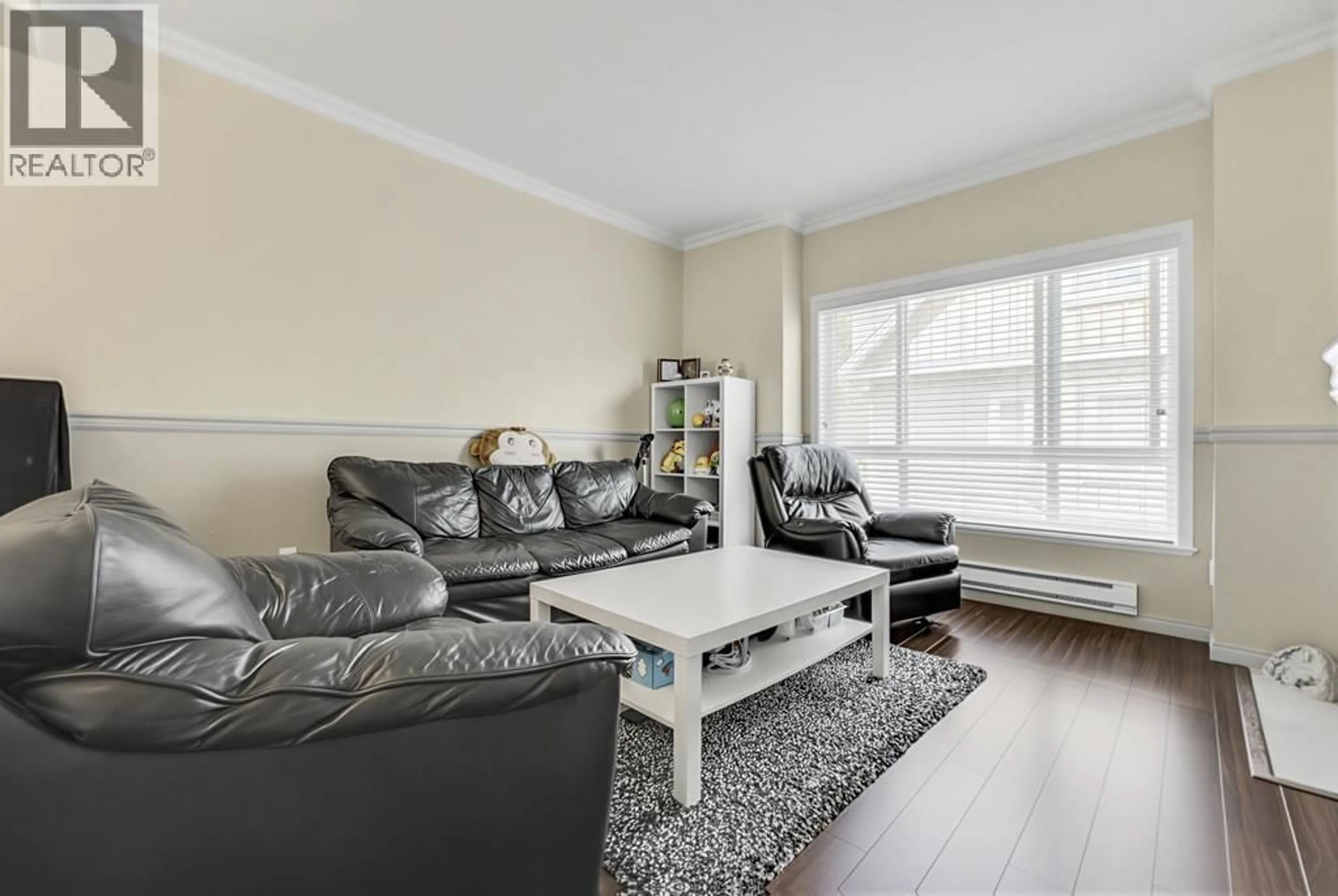 Living room with furniture, wood/laminate floor for 27 - 9451 GRANVILLE AVENUE, Richmond British Columbia V6Y1P9
