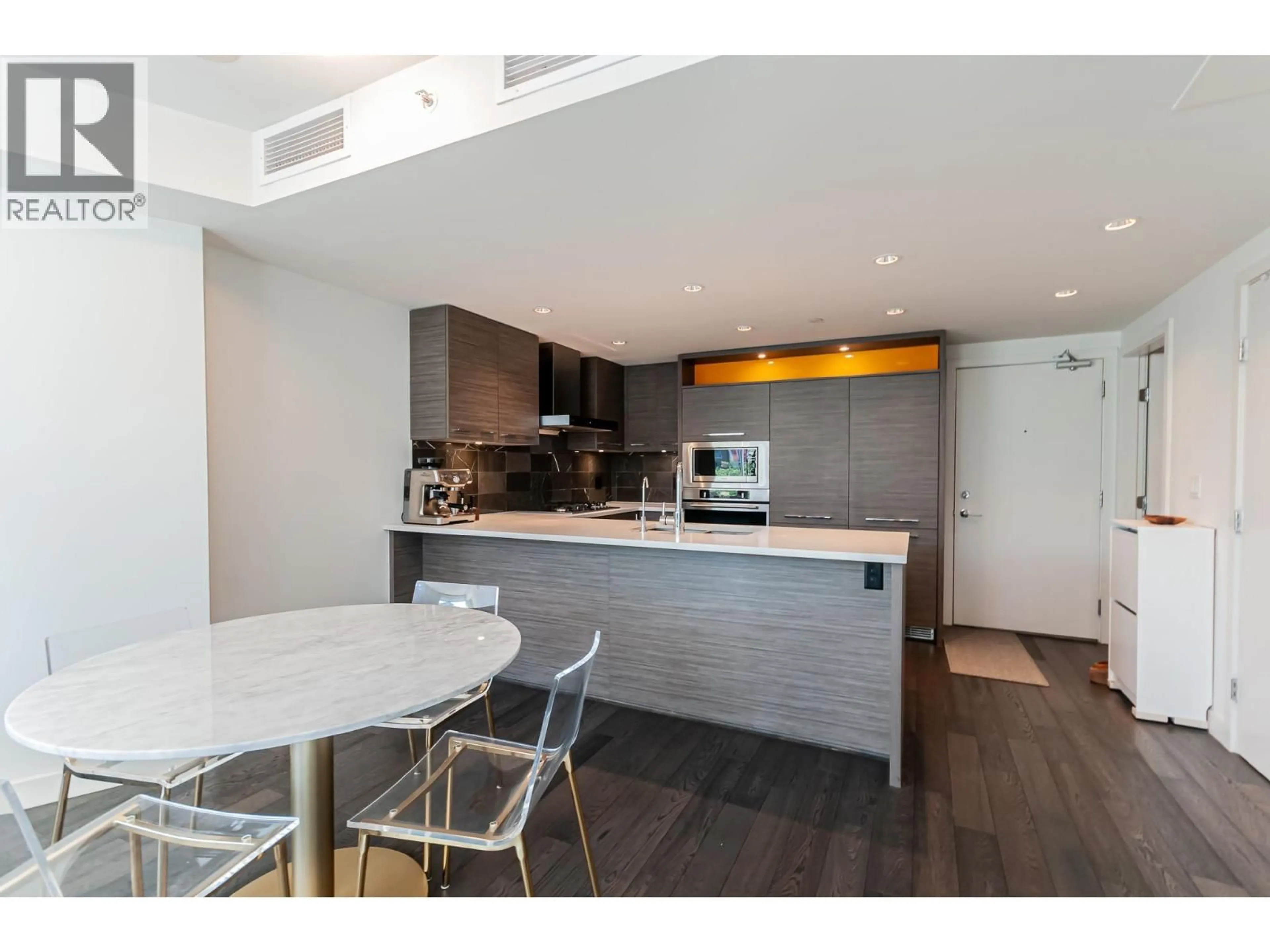 Open concept kitchen, wood/laminate floor for 319 - 7468 LANSDOWNE ROAD, Richmond British Columbia V7C0B7