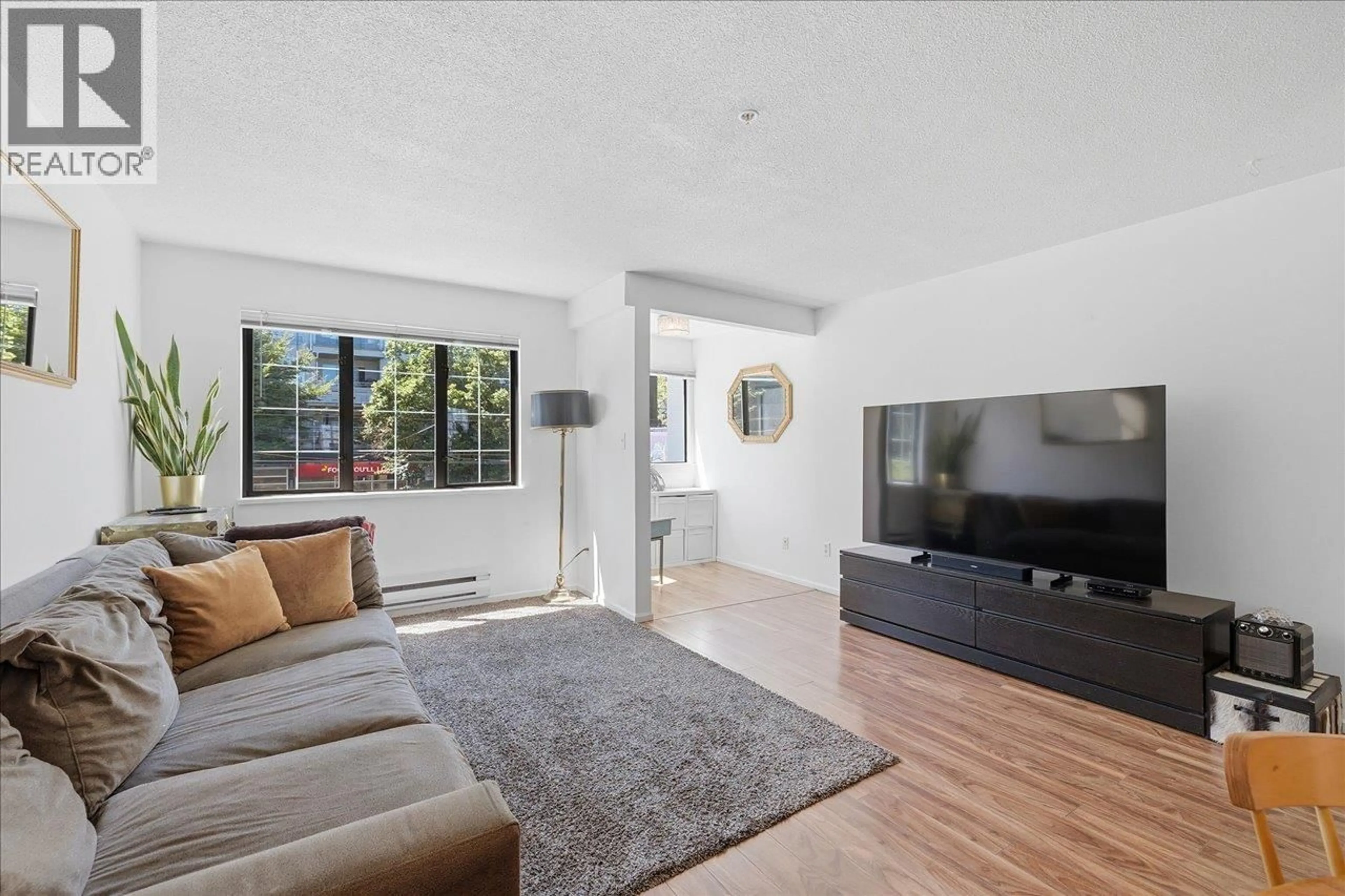 Living room with furniture, unknown for 203 - 3368 MAIN STREET, Vancouver British Columbia V5V3M7