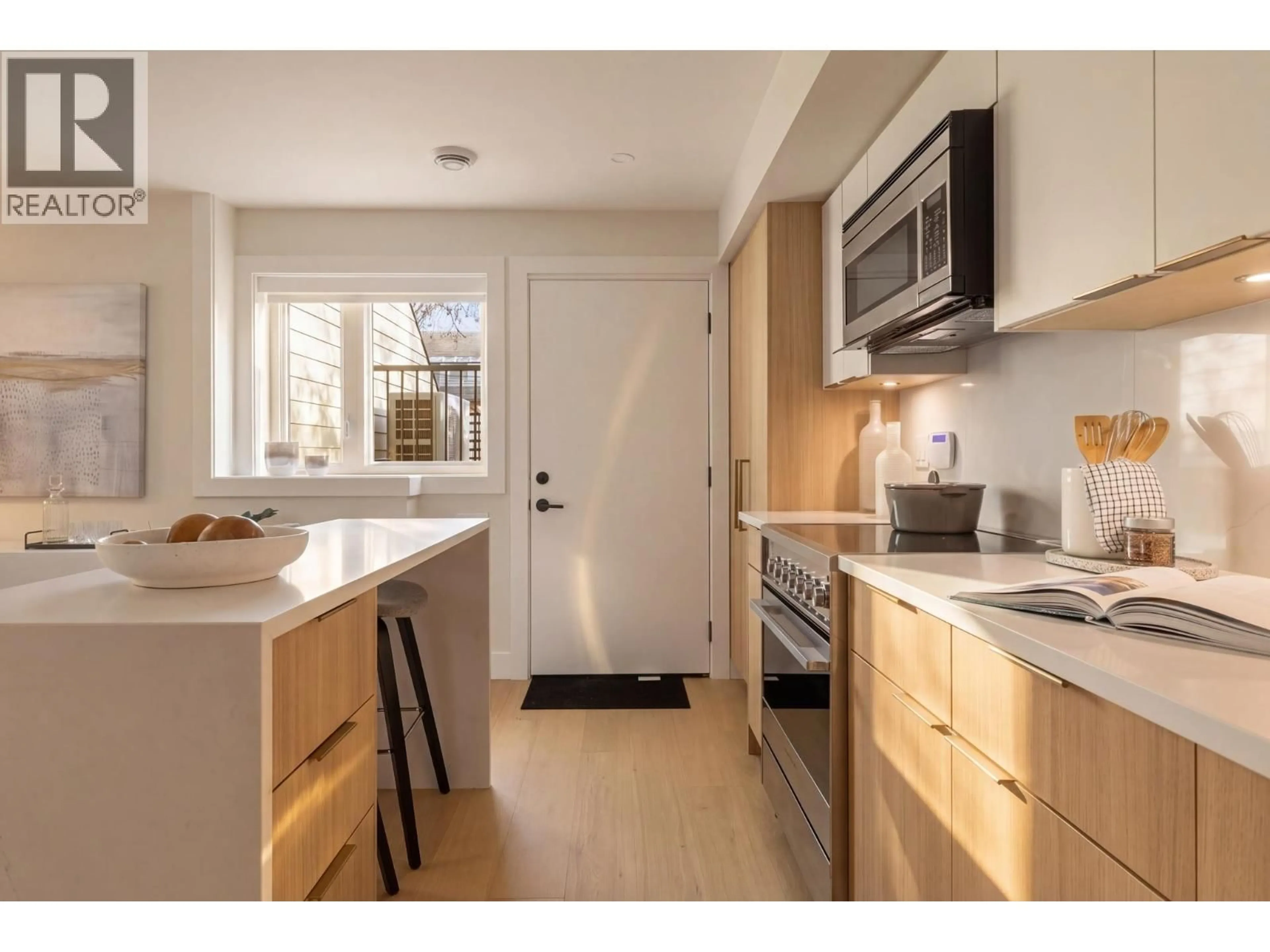 Standard kitchen, wood/laminate floor for 1 - 1937 TEMPLETON DRIVE, Vancouver British Columbia V5N4V9
