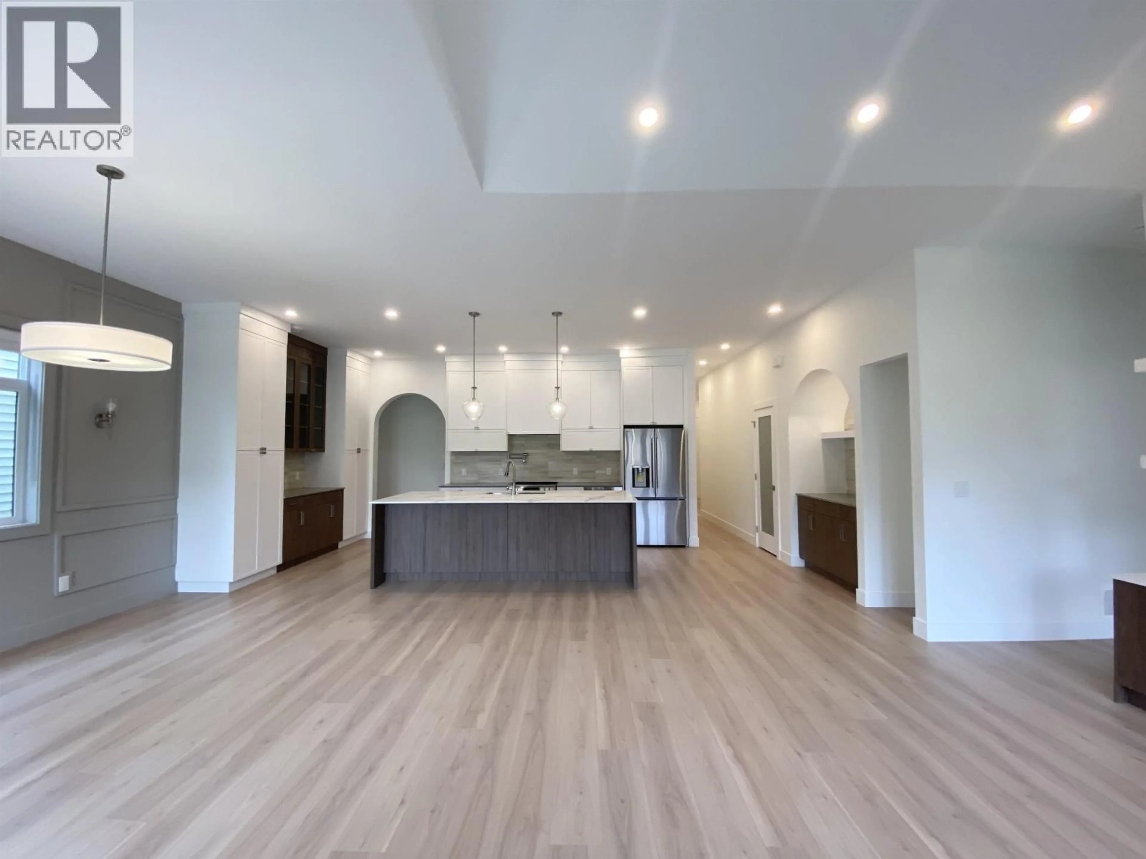 Open concept kitchen, wood/laminate floor for 4004 NASH DRIVE, Terrace British Columbia V8G0L3