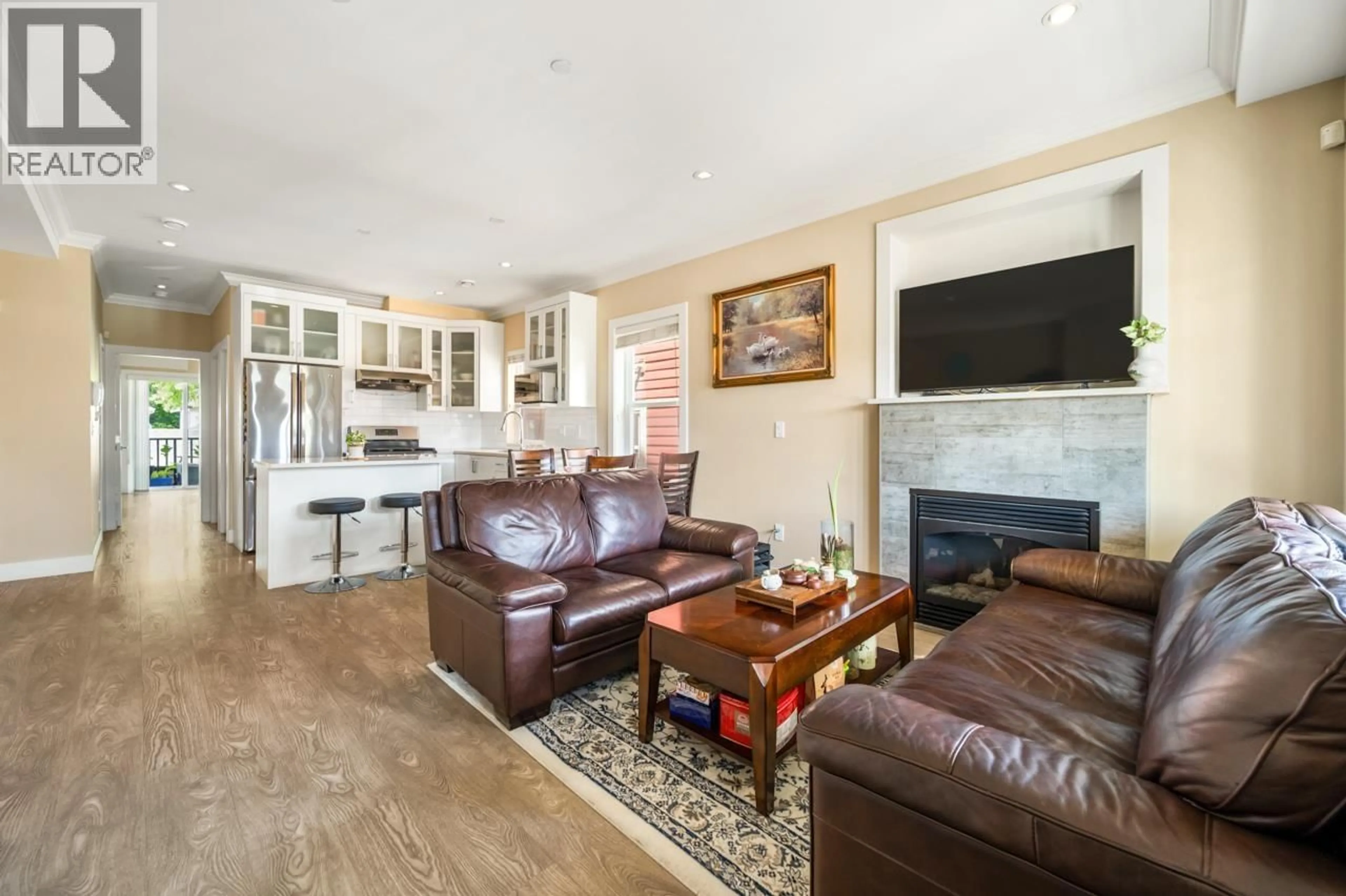 Living room with furniture, unknown for 201 - 4577 SLOCAN STREET, Vancouver British Columbia V5R1Z8