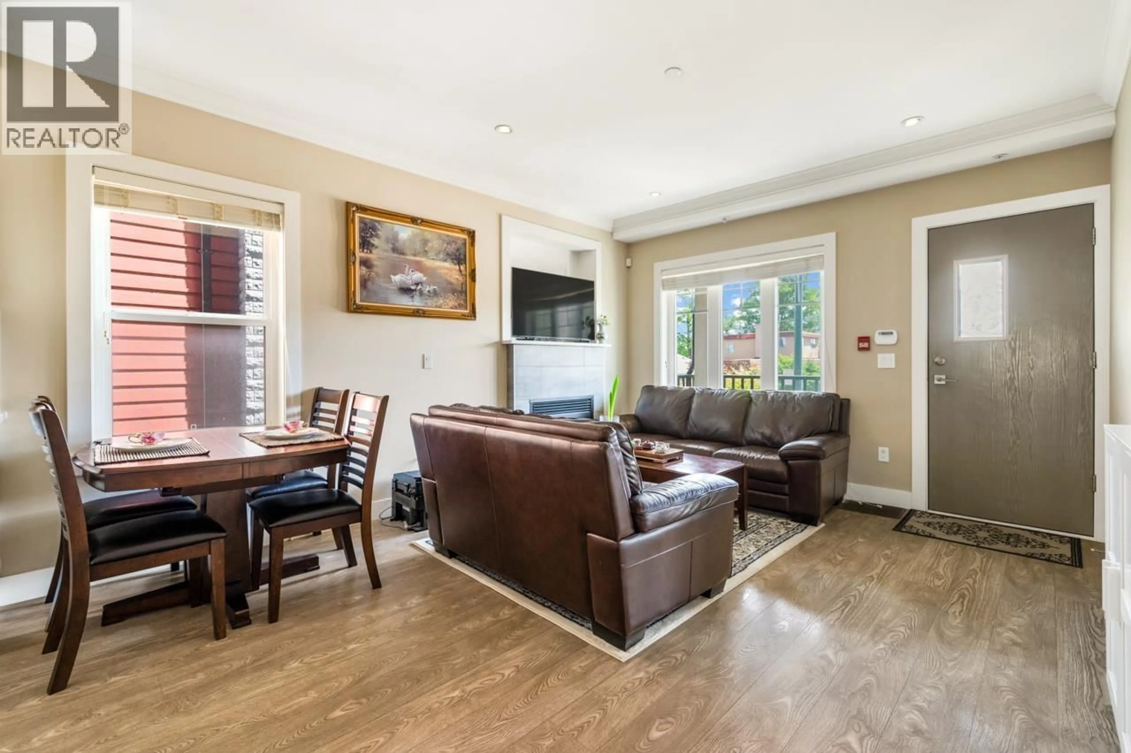 Living room with furniture, unknown for 201 - 4577 SLOCAN STREET, Vancouver British Columbia V5R1Z8