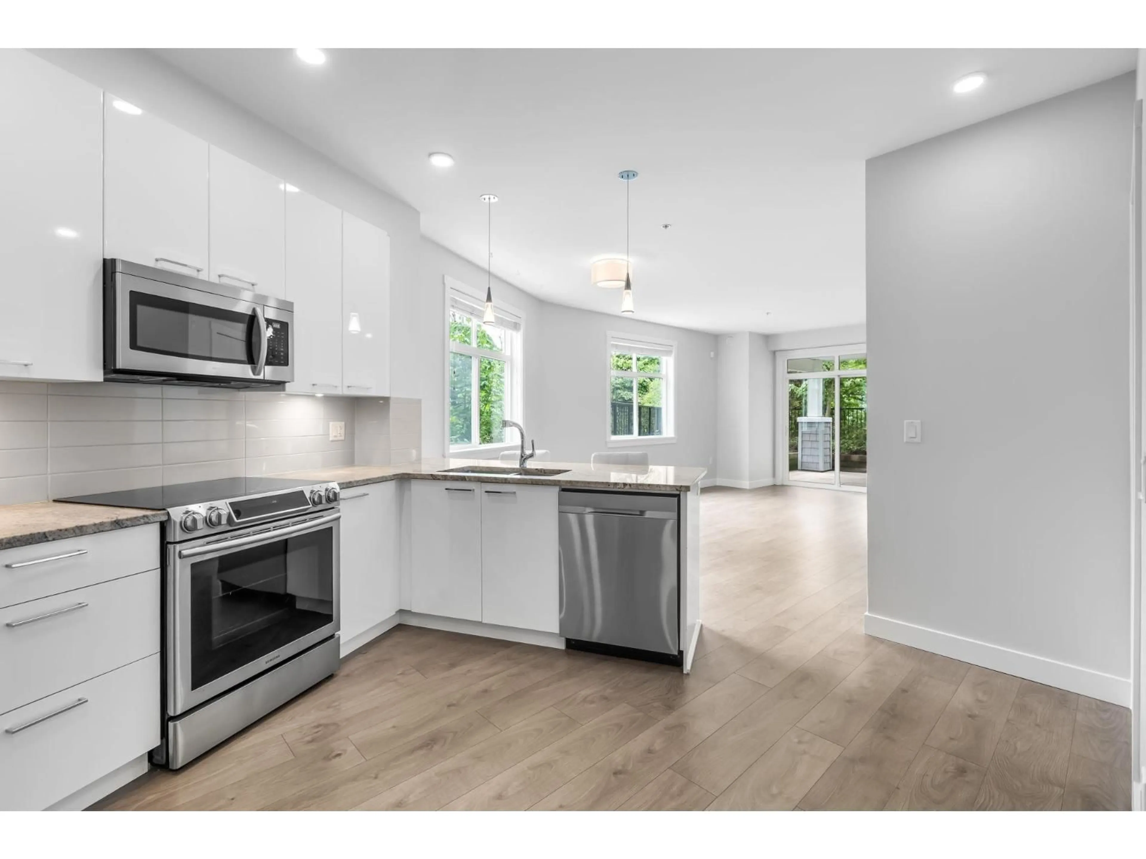Open concept kitchen, unknown for 107 - 19940 BRYDON CRESCENT, Langley British Columbia V3A0K8