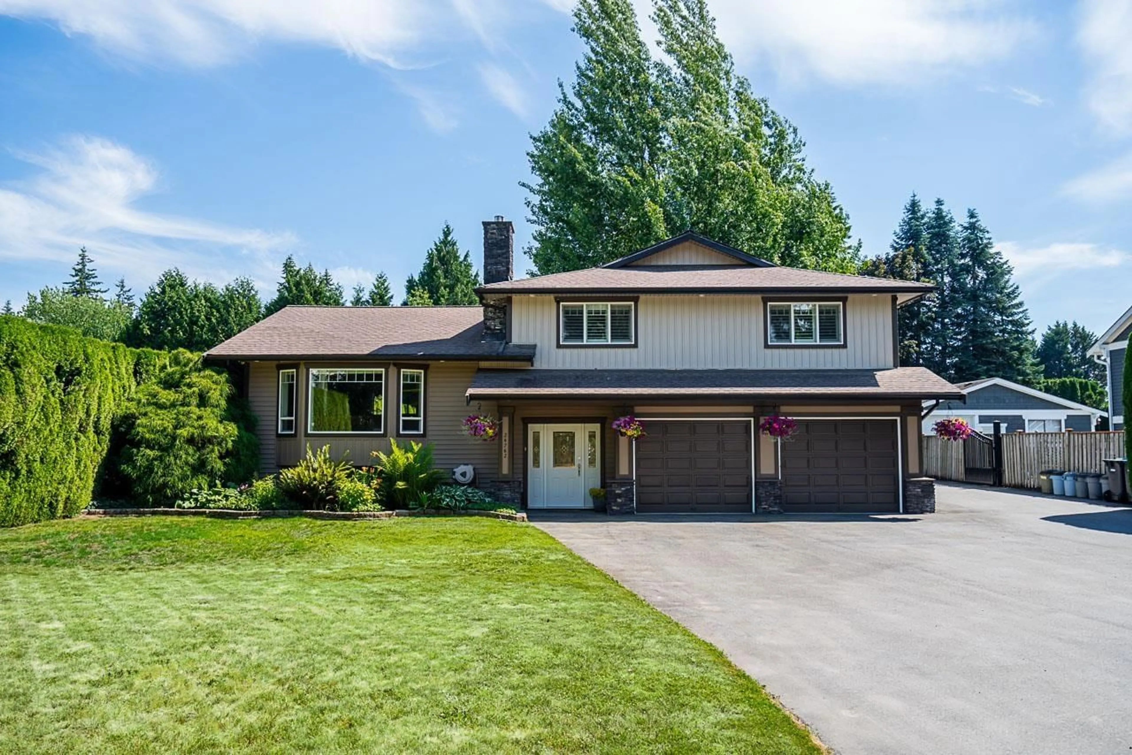 Home with vinyl exterior material, street for 24762 58A AVENUE, Langley British Columbia V2Z1H3